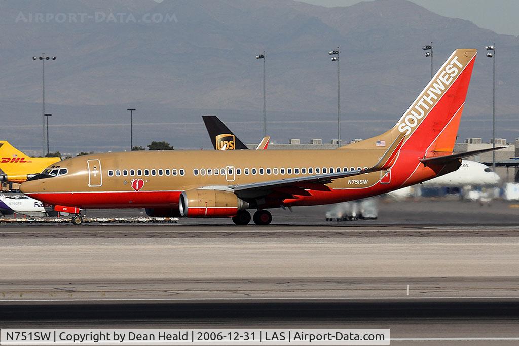 N751SW, 1999 Boeing 737-7H4 C/N 29803, Southwest Airlines N751SW (FLT SWA1812) starting takeoff roll on RWY 25R enroute to Baltimore/Washington Int'l (KBWI).
