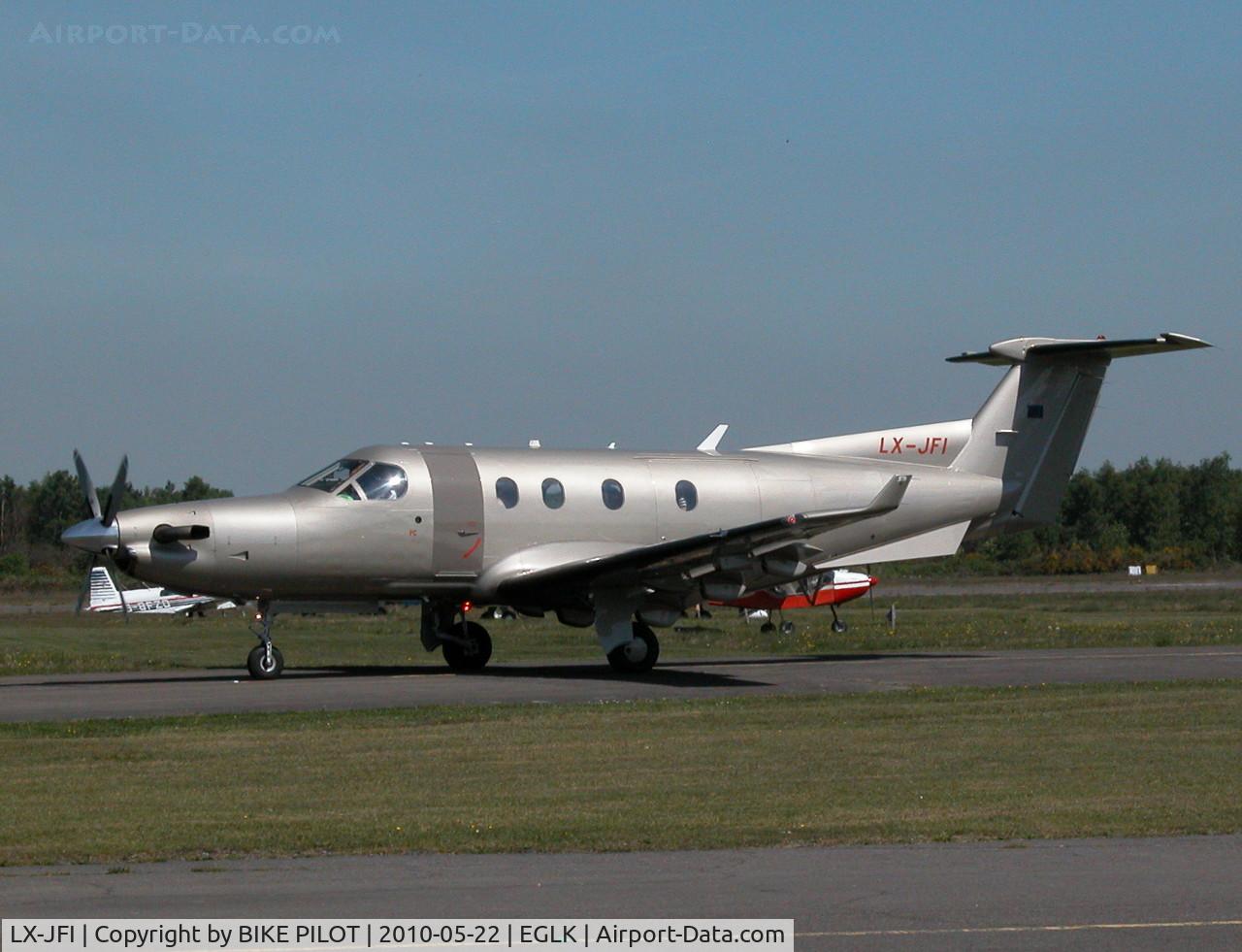 LX-JFI, 2004 Pilatus PC-12/45 C/N 574, TAXYING PAST THE CAFE