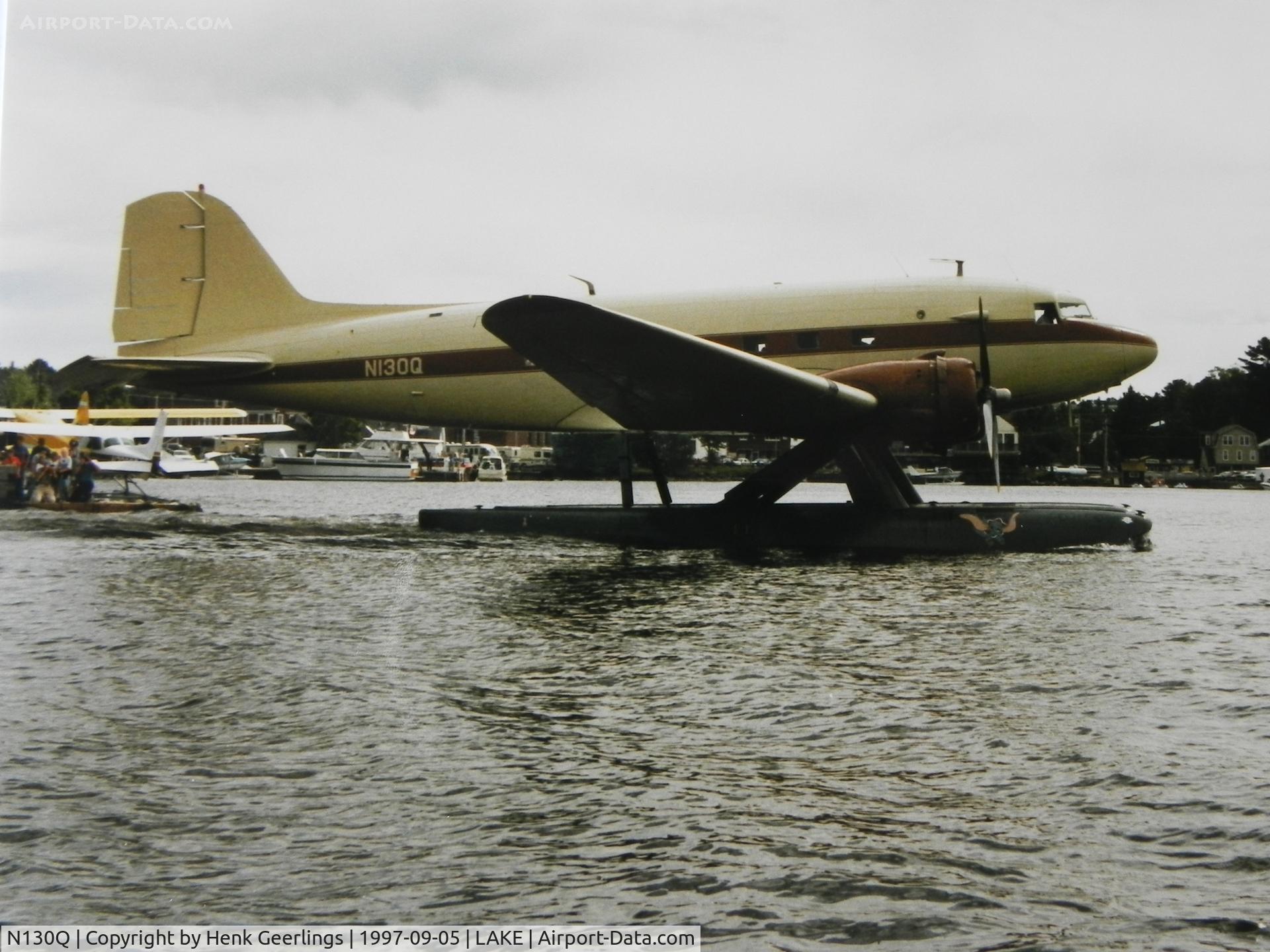 N130Q, 1943 Douglas DC-3-G202A Skytrooper C/N 11761, Folsome Air Service, Greenville , ME. 24th International Sea Plane Fly In , 1997 Moosehead Lake, Greenville , Maine, USA Scan from photograp