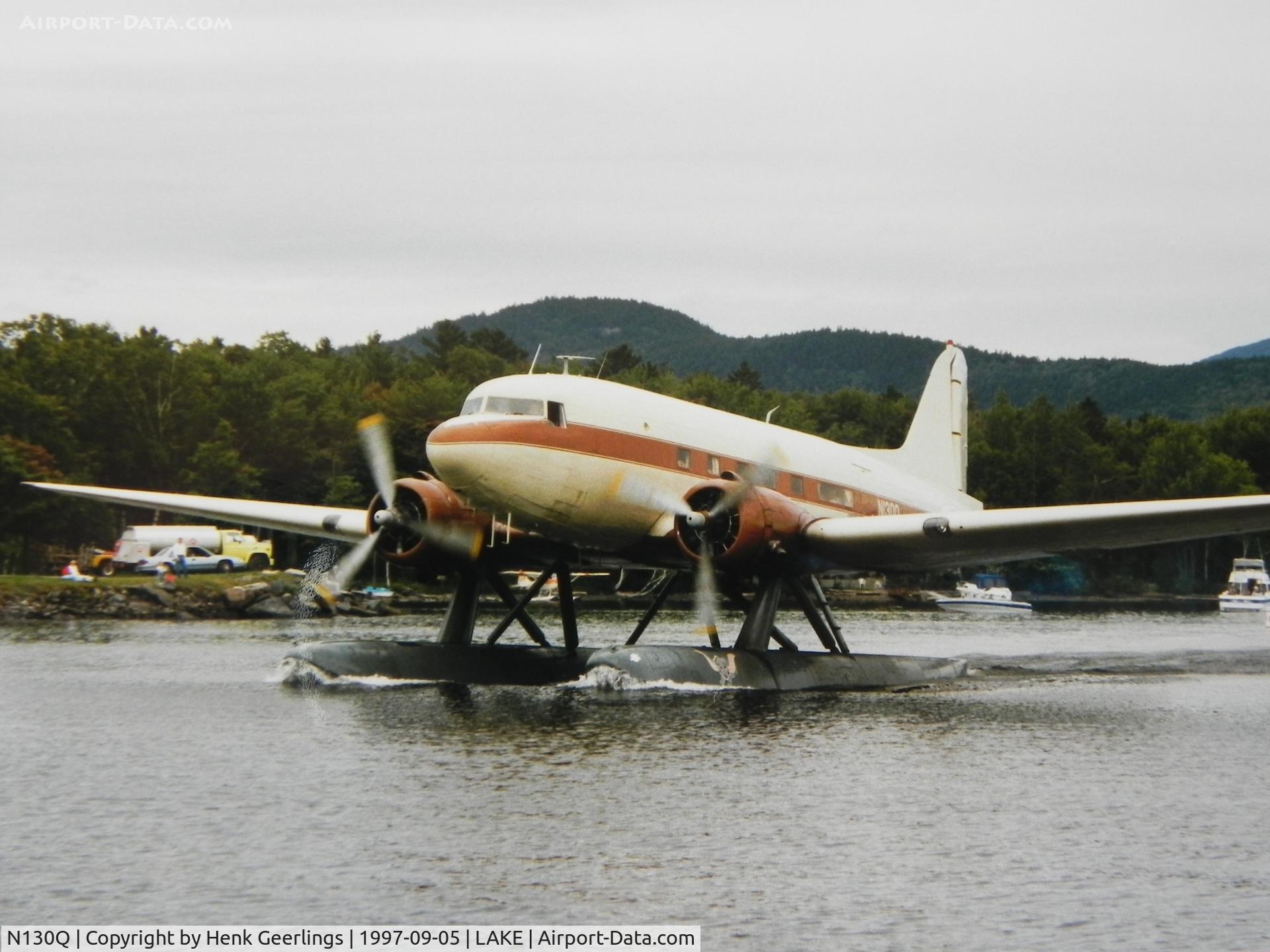 N130Q, 1943 Douglas DC-3-G202A Skytrooper C/N 11761, Folsome Air Service, Greenville , ME. 24th International Sea Plane Fly In , 1997 Moosehead Lake, Greenville , Maine, USA Scan from photograp