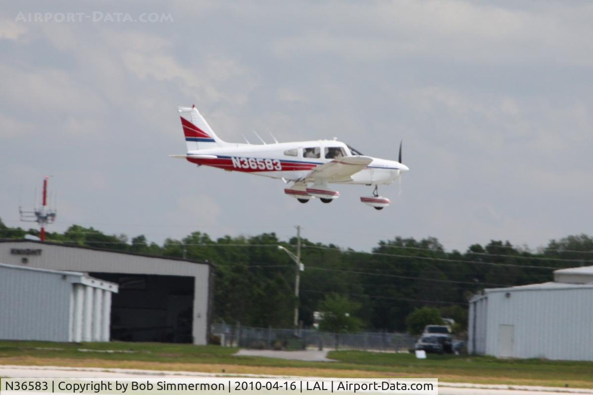 N36583, 1978 Piper PA-28-161 Cherokee Warrior II C/N 28-7816647, Arriving at Lakeland, Florida during Sun N Fun 2010.