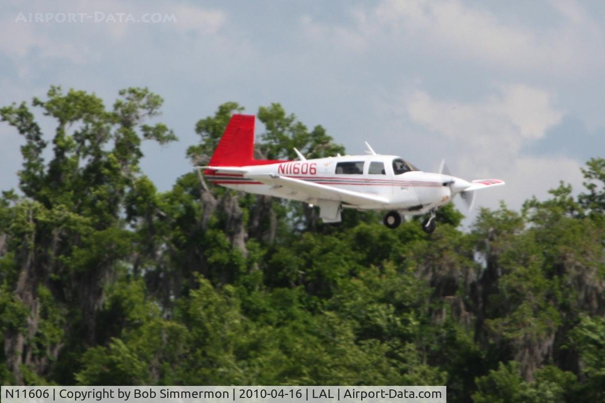 N11606, 1982 Mooney M20J 201 C/N 24-1276, Arriving at Lakeland, Florida during Sun N Fun 2010.