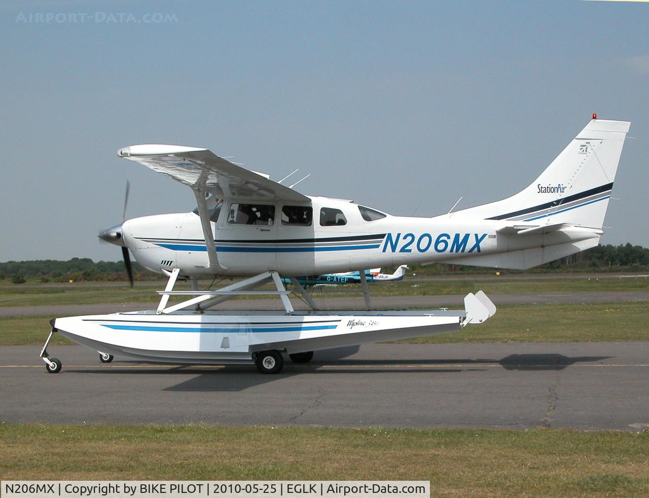N206MX, 2001 Cessna 206H Stationair C/N 20608149, TAXYING PAST THE CAFE