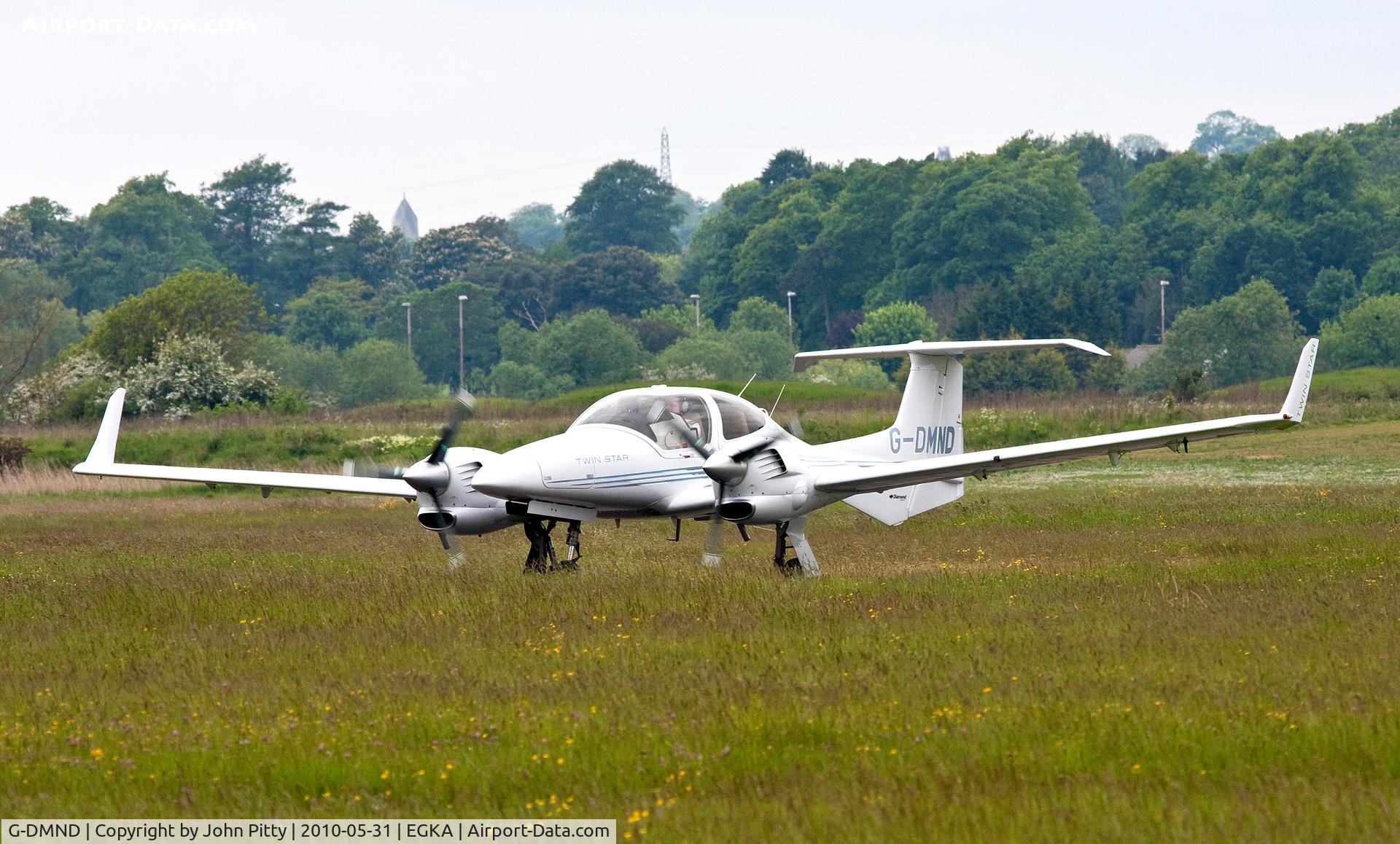 G-DMND, 2005 Diamond DA-42 Twin Star C/N 42.068, Shoreham Airport, West Sussex. Very dull overcast day..