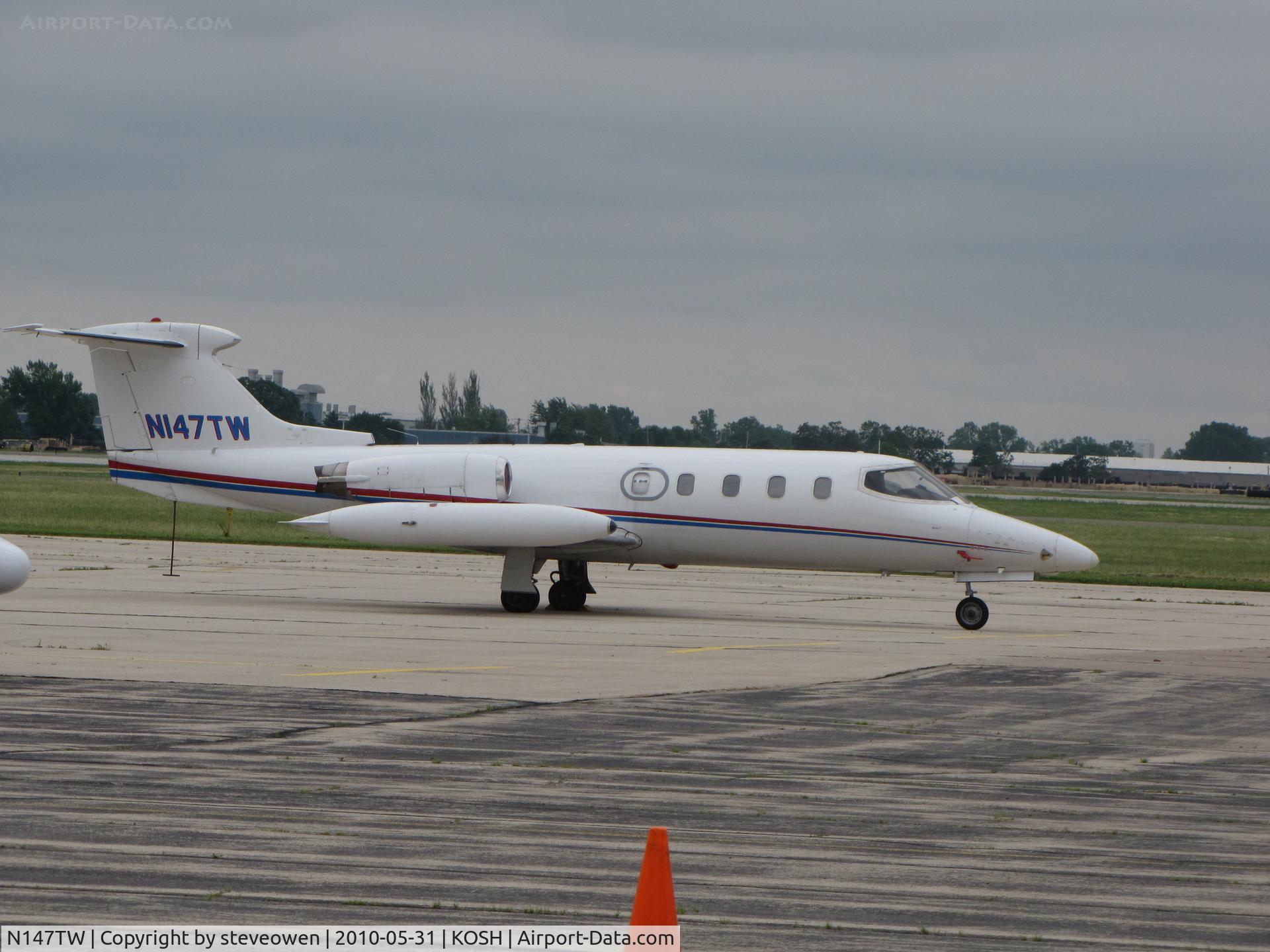 N147TW, 1968 Learjet Inc 25 C/N 023, Basler ramp on a grey day