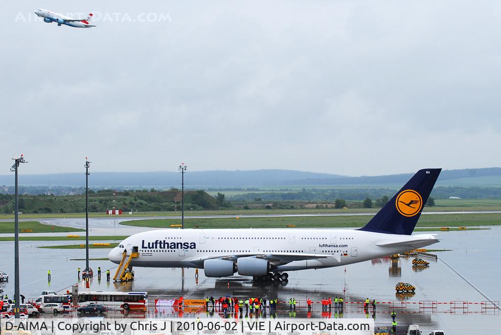 D-AIMA, 2010 Airbus A380-841 C/N 038, Size comparison: Lufthansa A380 (D-AIMA) with Austrian A320 (OE-LBR) departing.