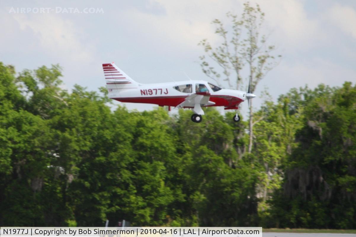 N1977J, 1976 Rockwell International 114 Commander C/N 14080, Arriving at Lakeland, Florida during Sun N Fun 2010.