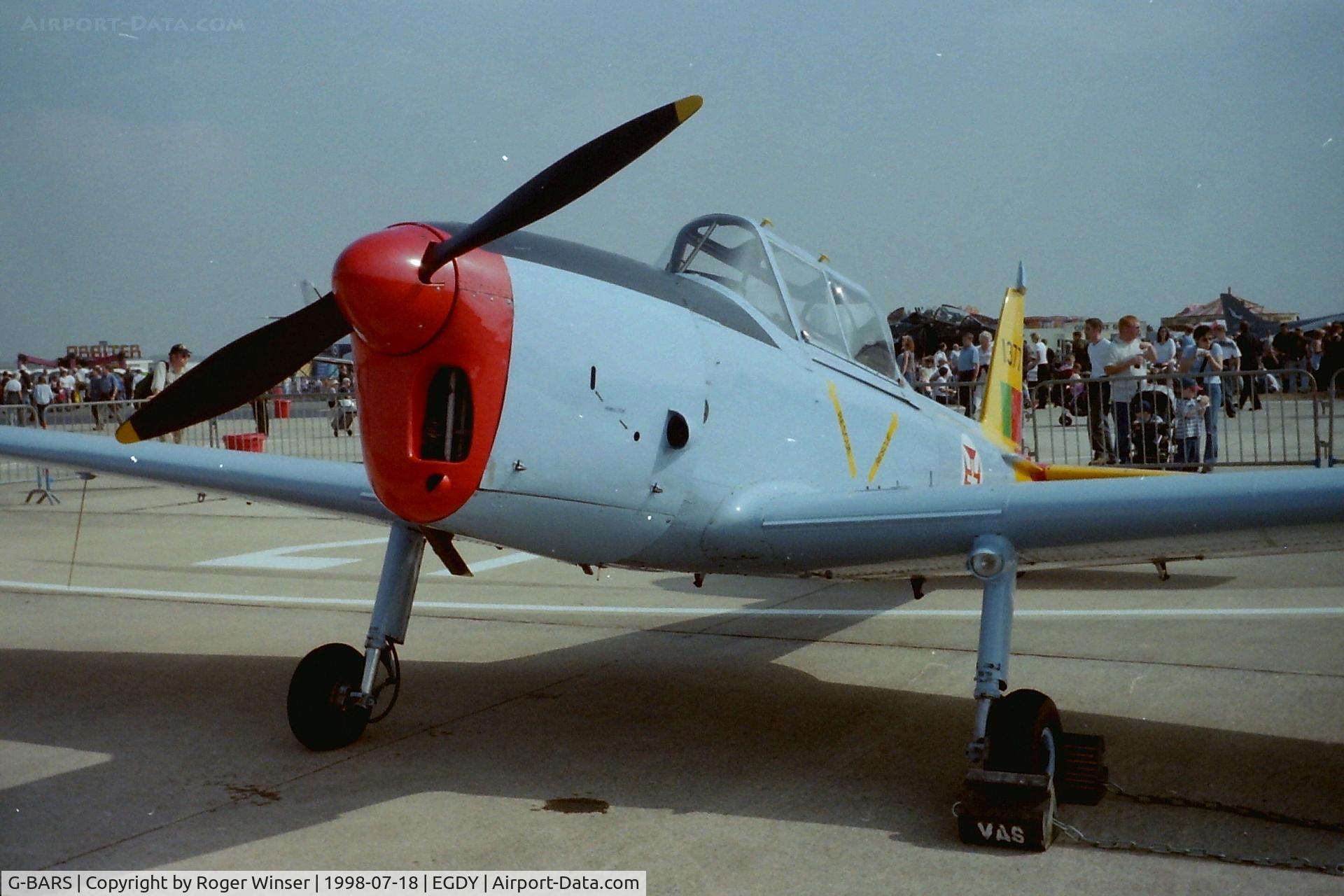 G-BARS, 1952 De Havilland DHC-1 Chipmunk T.10 C/N C1/0557, Previously WK520 in RAF service, now representing a Chipmunk in the Portuguese Air Force (s/n 1377). At RNAS Yeovilton Air Day 1998