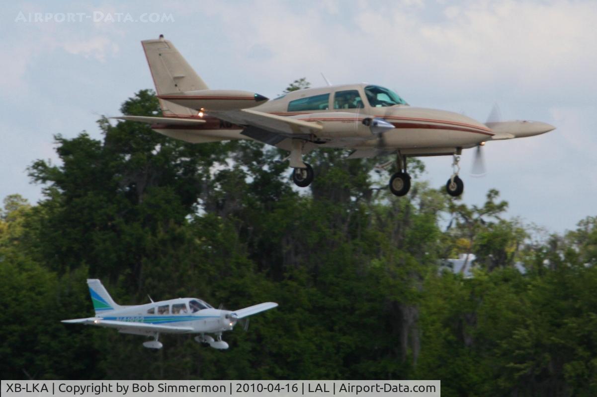 XB-LKA, 1979 Cessna T310R C/N 310R1599, Arriving at Lakeland, Florida during Sun N Fun 2010.