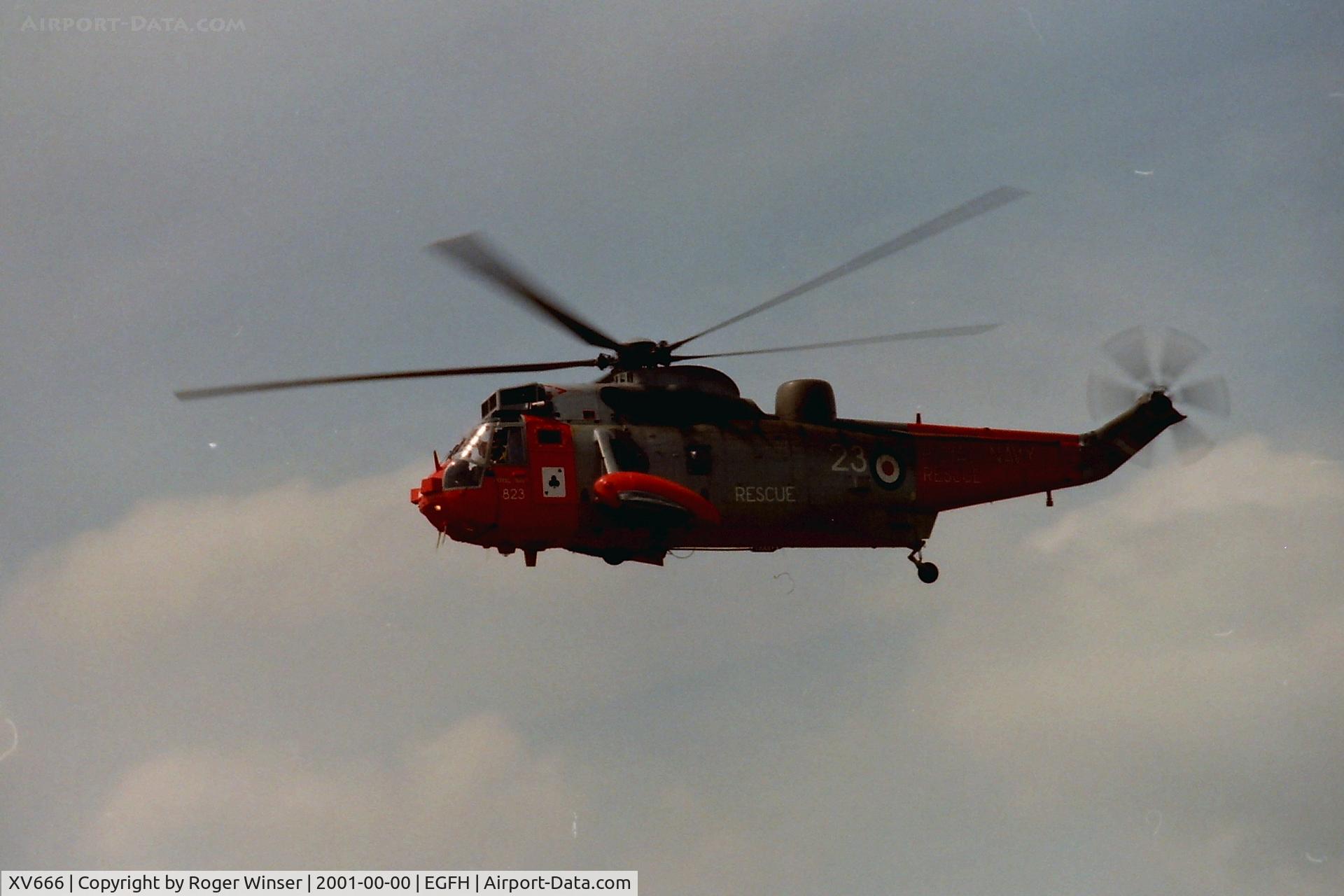 XV666, 1970 Westland Sea King HAR.5 C/N WA654, RNAS Culdrose rescue Sea King HAR.5 helicopter coded 823/CU of 771 NAS departing Swansea Airport after taking on fuel. Summer 2001