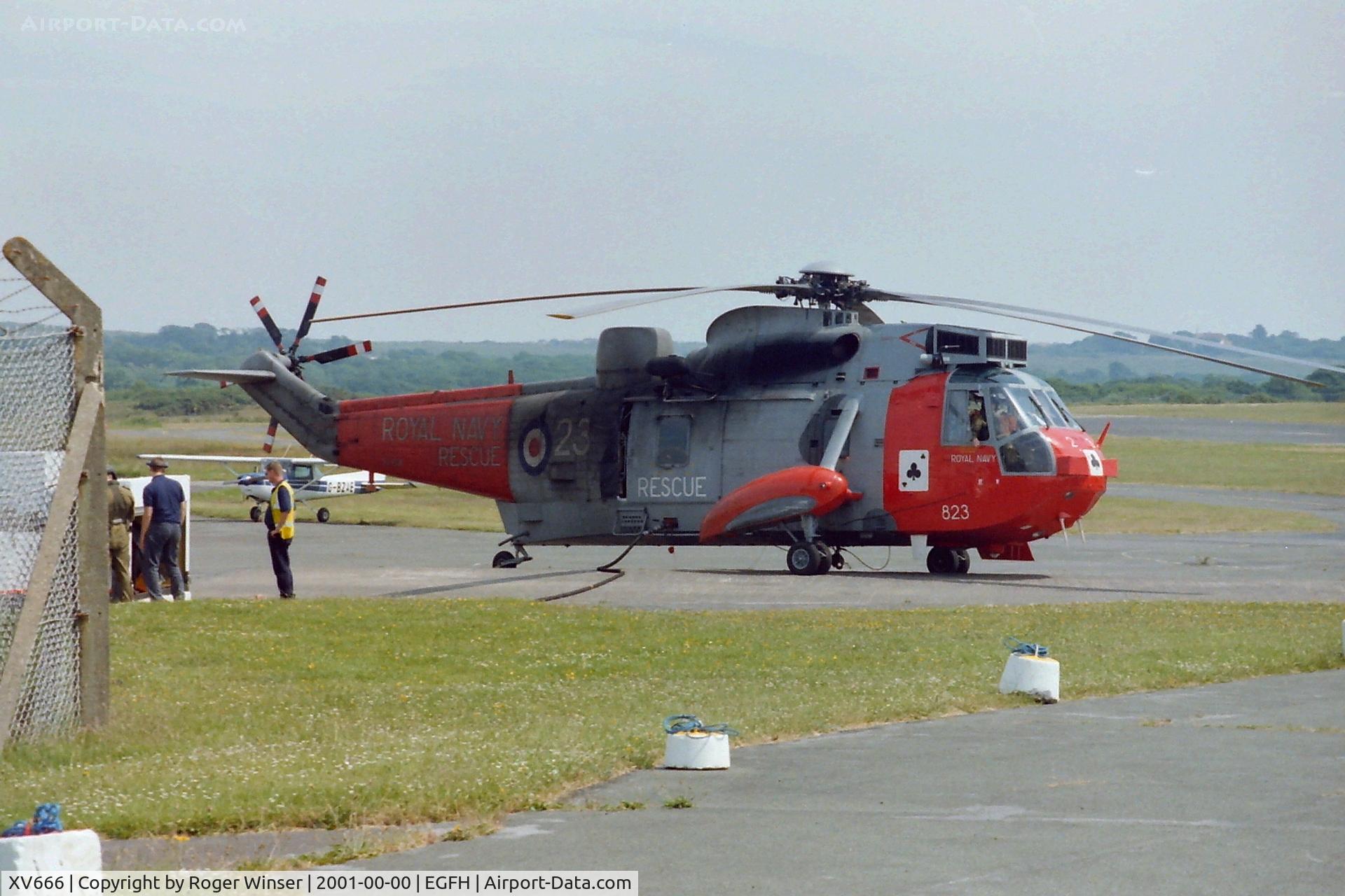XV666, 1970 Westland Sea King HAR.5 C/N WA654, RNAS Culdrose rescue Sea King HAR.5 helicopter coded 823/CU of 771 NAS taking on fuel at Swansea Airport. Summer 2001