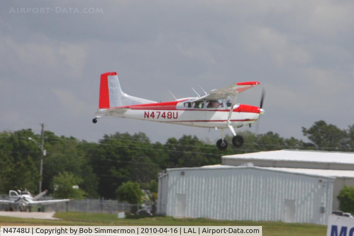 N4748U, 1965 Cessna 180 C/N 18051448, Arriving at Lakeland, Florida during Sun N Fun 2010.