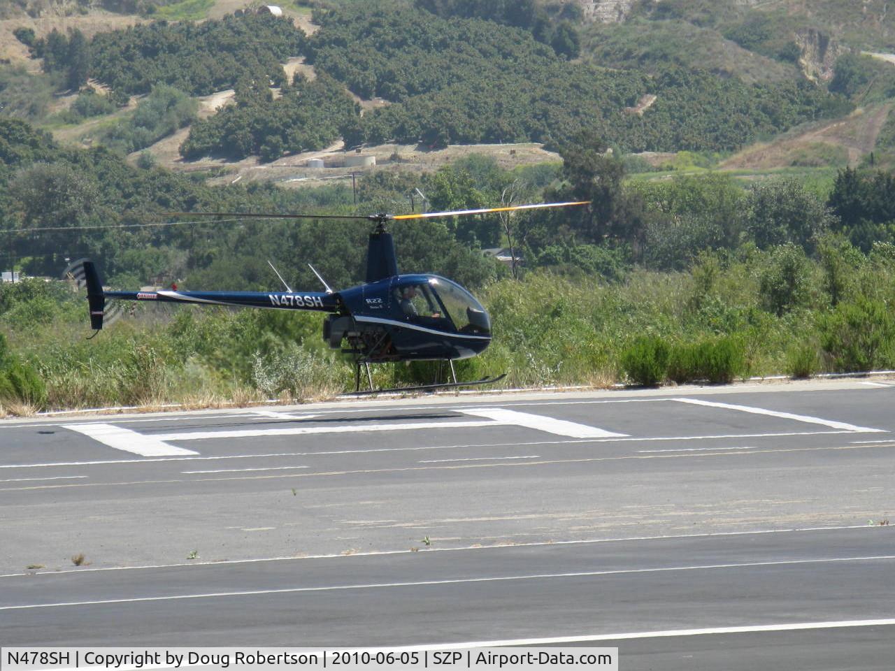 N478SH, 2006 Robinson R22 Beta C/N 4056, 2006 Robinson R22 BETA II, Lycoming O-360-J2A derated to 131 Hp, near touchdown on SZP's helipad