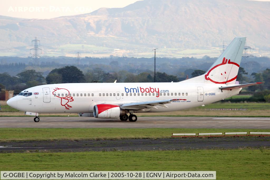 G-OGBE, 1995 Boeing 737-3L9 C/N 27834, Boeing 737-3L9 back tracking to take off on 23 at Durham Tees Valley Airport in 2005.