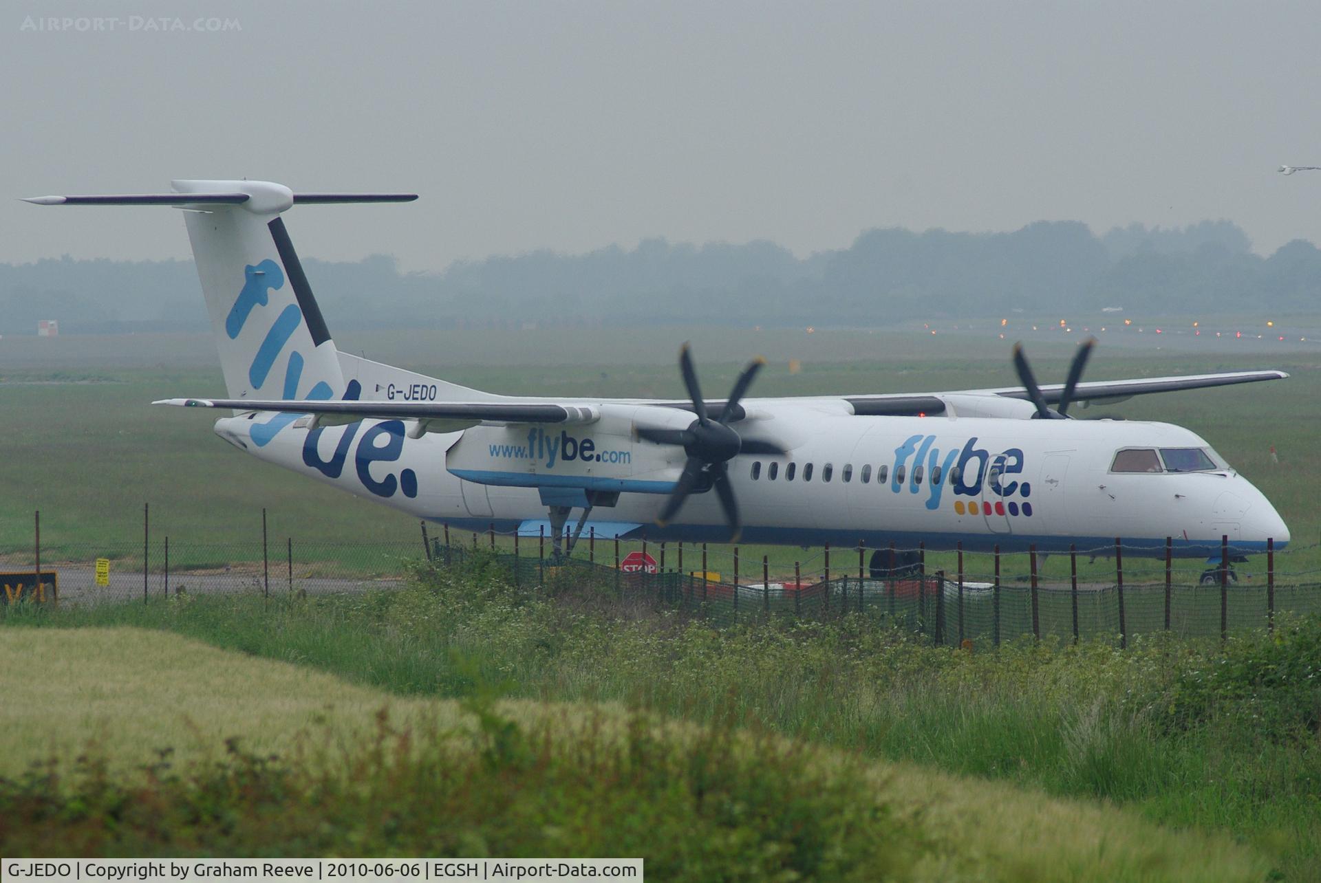 G-JEDO, 2003 De Havilland Canada DHC-8-402Q Dash 8 C/N 4079, Departing from Norwich.