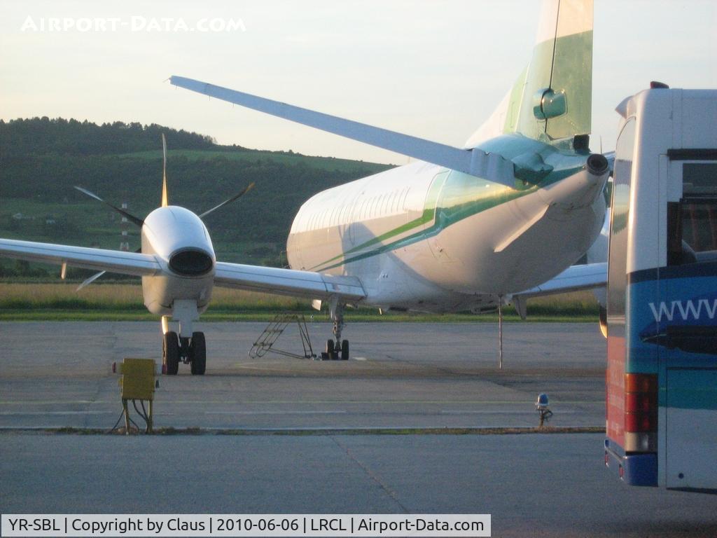 YR-SBL, 1995 Saab 2000 C/N 2000-013, Parked on the apron