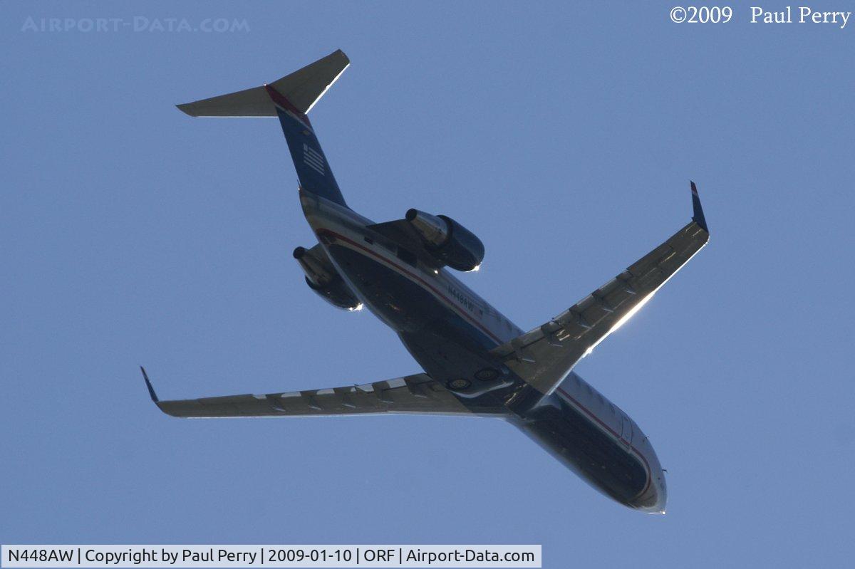 N448AW, 2003 Bombardier CRJ-200LR (CL-600-2B19) C/N 7814, Soaring overhead while departing Norfolk International