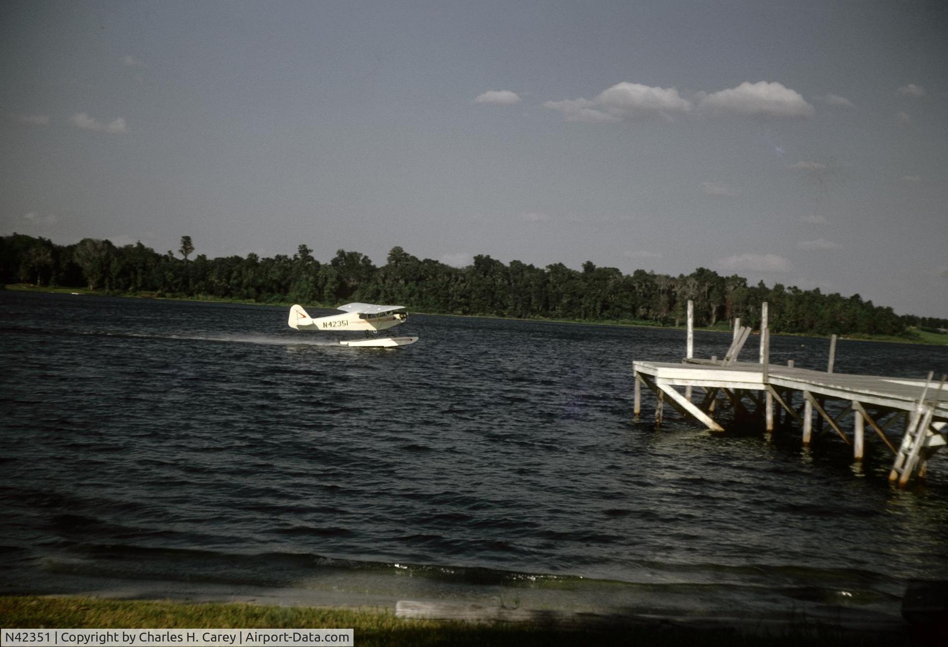 N42351, 1945 Piper J3C-65 Cub Cub C/N 14601, Taking off from Lake Iola, Pasco County, Florida, 1968, pilot and owner Tom McCabe