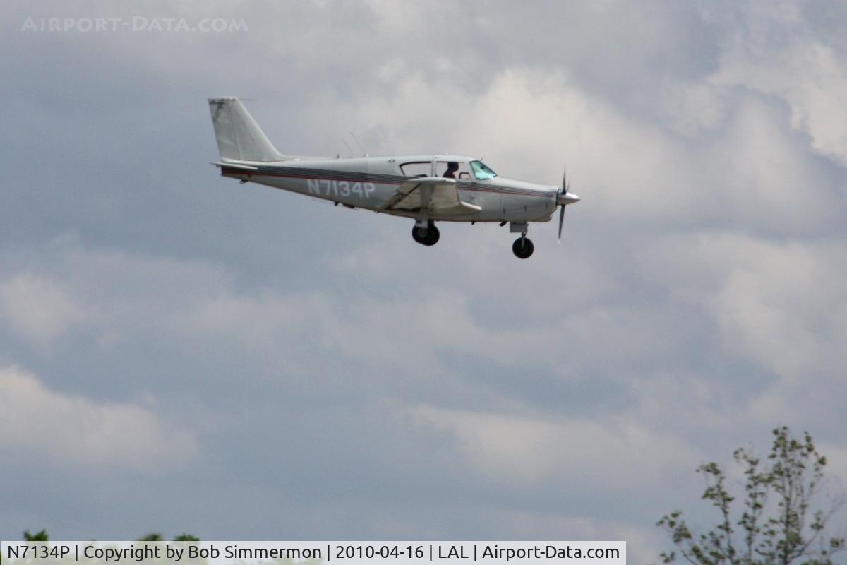 N7134P, 1960 Piper PA-24-250 Comanche C/N 24-2299, Arriving at Lakeland, Florida during Sun N Fun 2010.