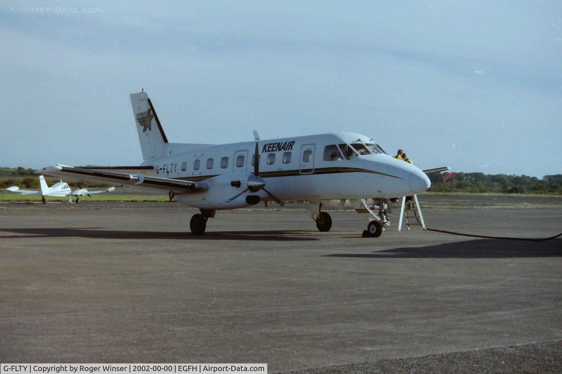 G-FLTY, 1979 Embraer EMB-110P1 Bandeirante C/N 110215, Keenair Bandeirante at Swansea Airport. Summer 2002