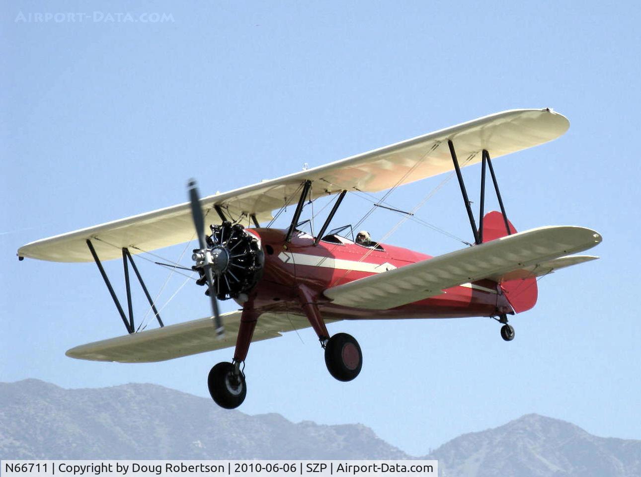N66711, 1941 Boeing IB75A C/N 75-1675, 1941 Boeing Stearman IB75A, originally a PT-17, Jacobs R-755B2 275 Hp, Restricted, Experimental class, newly rebuilt, re-covered, stunning refinish by Rowena's Flying Fabric Company at SZP, on final Rwy 22