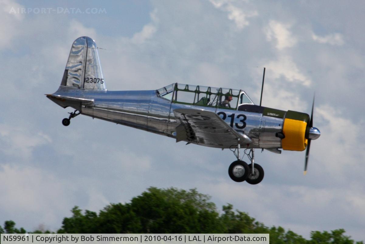 N59961, 1942 Consolidated Vultee BT-13A C/N 7722, Arriving at Lakeland, Florida during Sun N Fun 2010.
