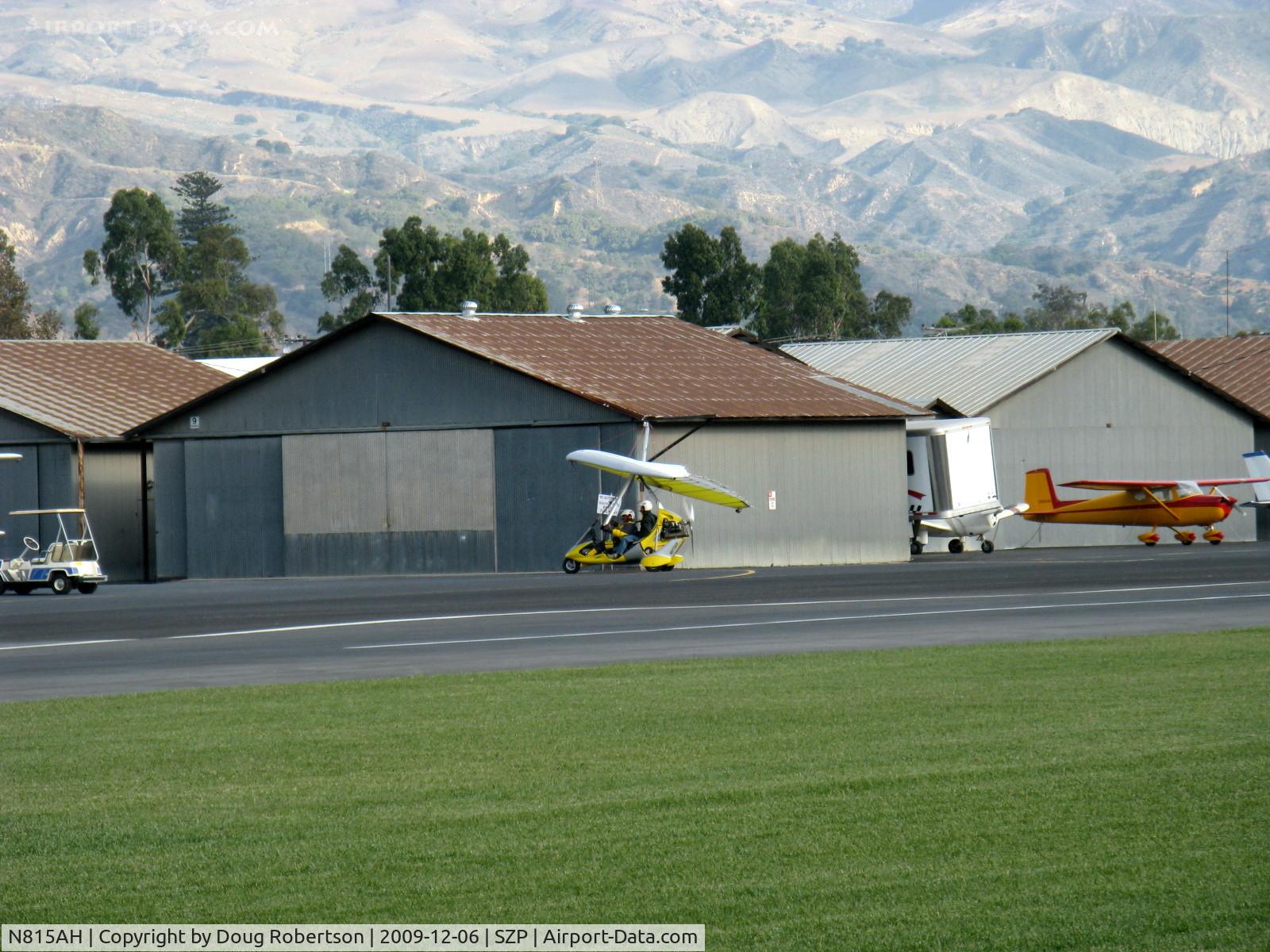 N815AH, 2006 Air Creation Tanarg C/N T06076, 2006 Air Creation USA TANARG, Rotax 912ULS 80 Hp tri-blade pusher prop, two-place weight-shift control Experimental class Light Sport aircraft, taxi to hangar. Snow in the Topa Topa mountains in background.