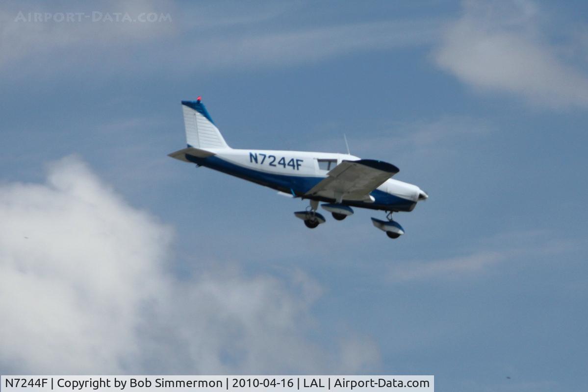 N7244F, 1968 Piper PA-28-140 Cherokee C/N 28-25160, Arriving at Lakeland, Florida during Sun N Fun 2010.