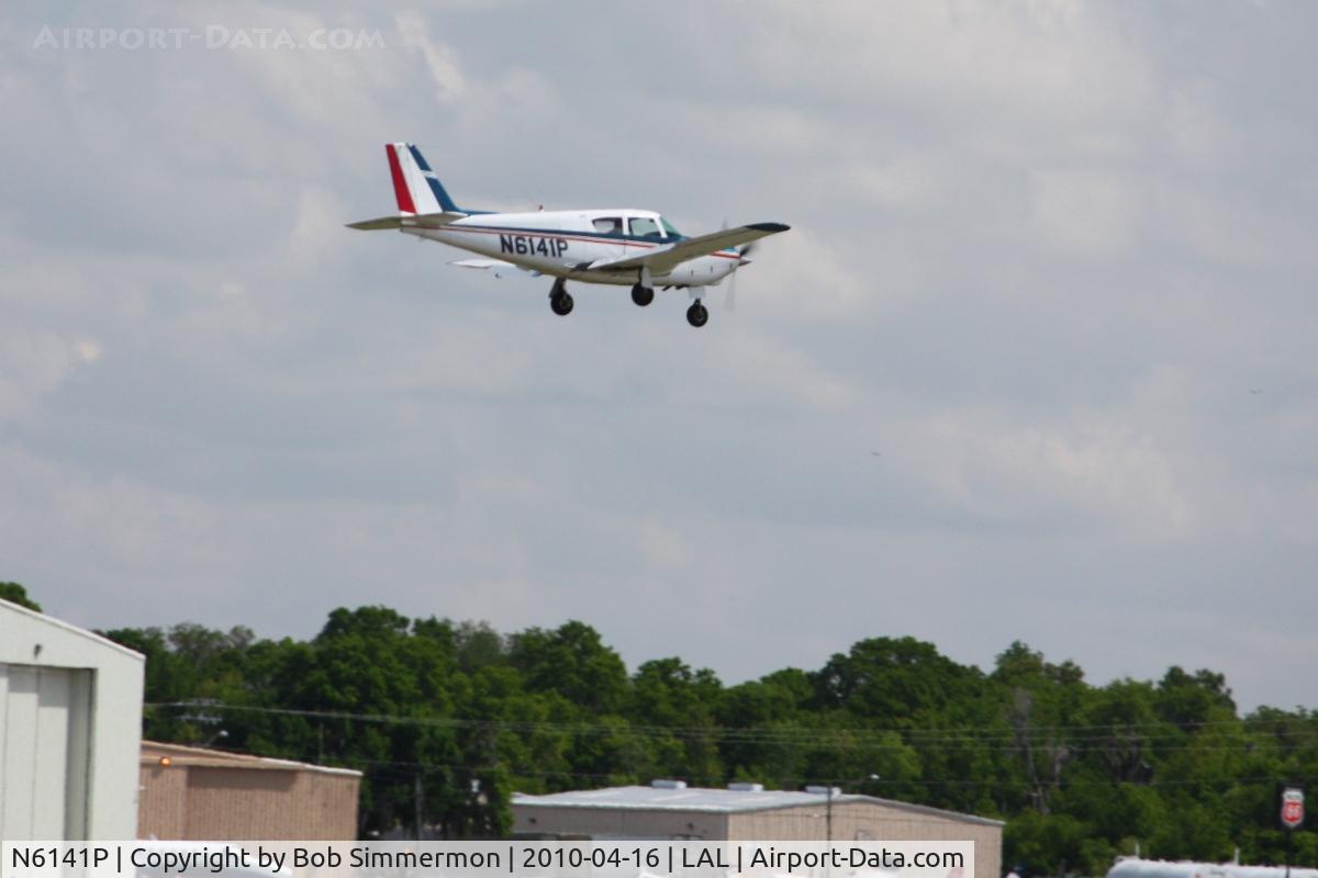 N6141P, 1959 Piper PA-24-250 Comanche C/N 24-1242, Arriving at Lakeland, Florida during Sun N Fun 2010.