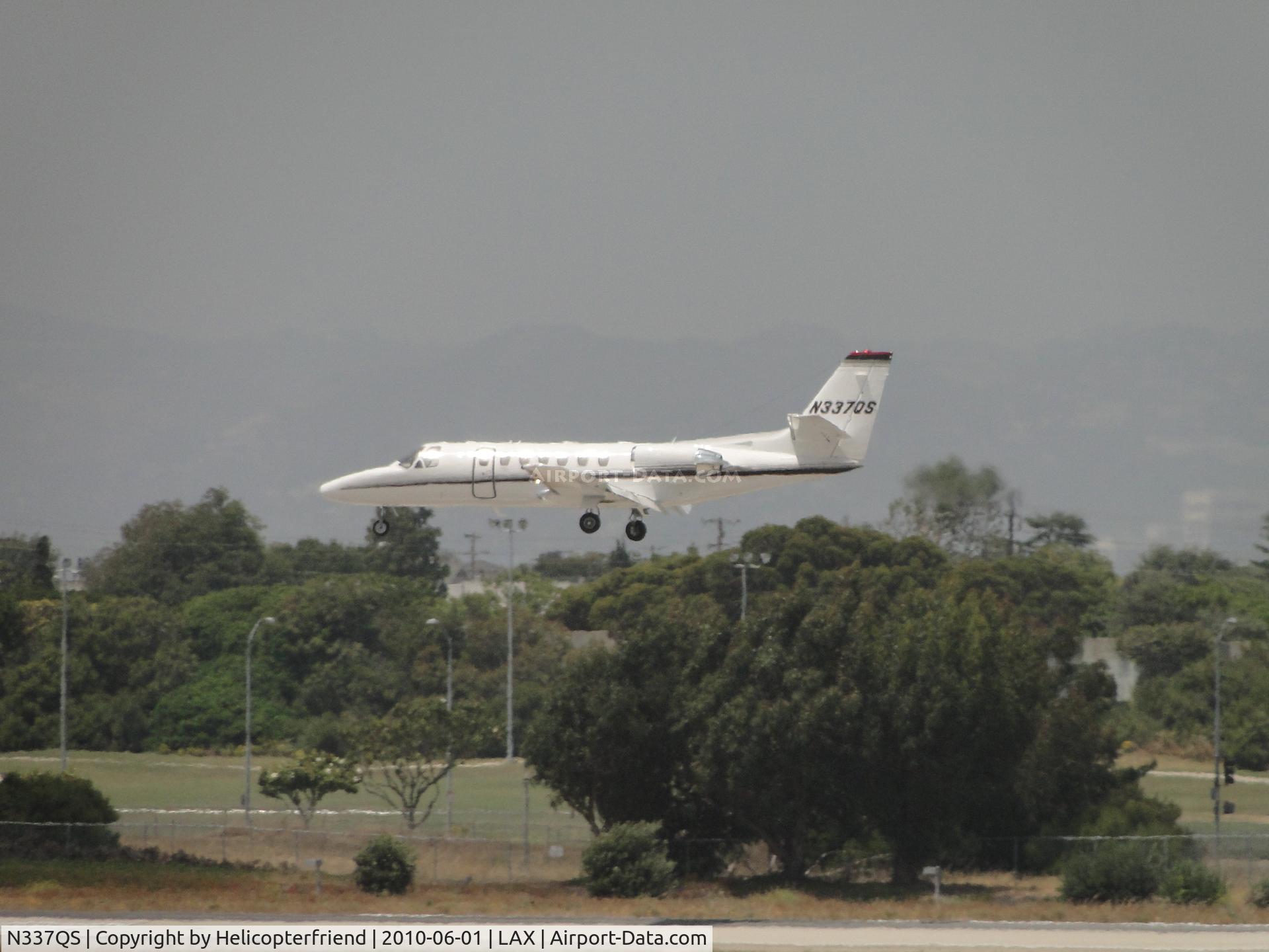 N337QS, 1997 Cessna 560 Citation Ultra C/N 560-0437, Landing on runway 24R