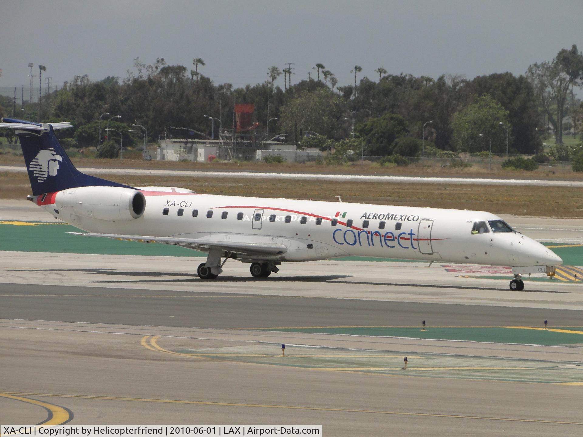 XA-CLI, 2004 Embraer ERJ-145LR (EMB-145LR) C/N 14500803, An Areomexico Connect Regional Jet, Embraer EMB-145LR, cn 14500803 taxiing to runway 24L