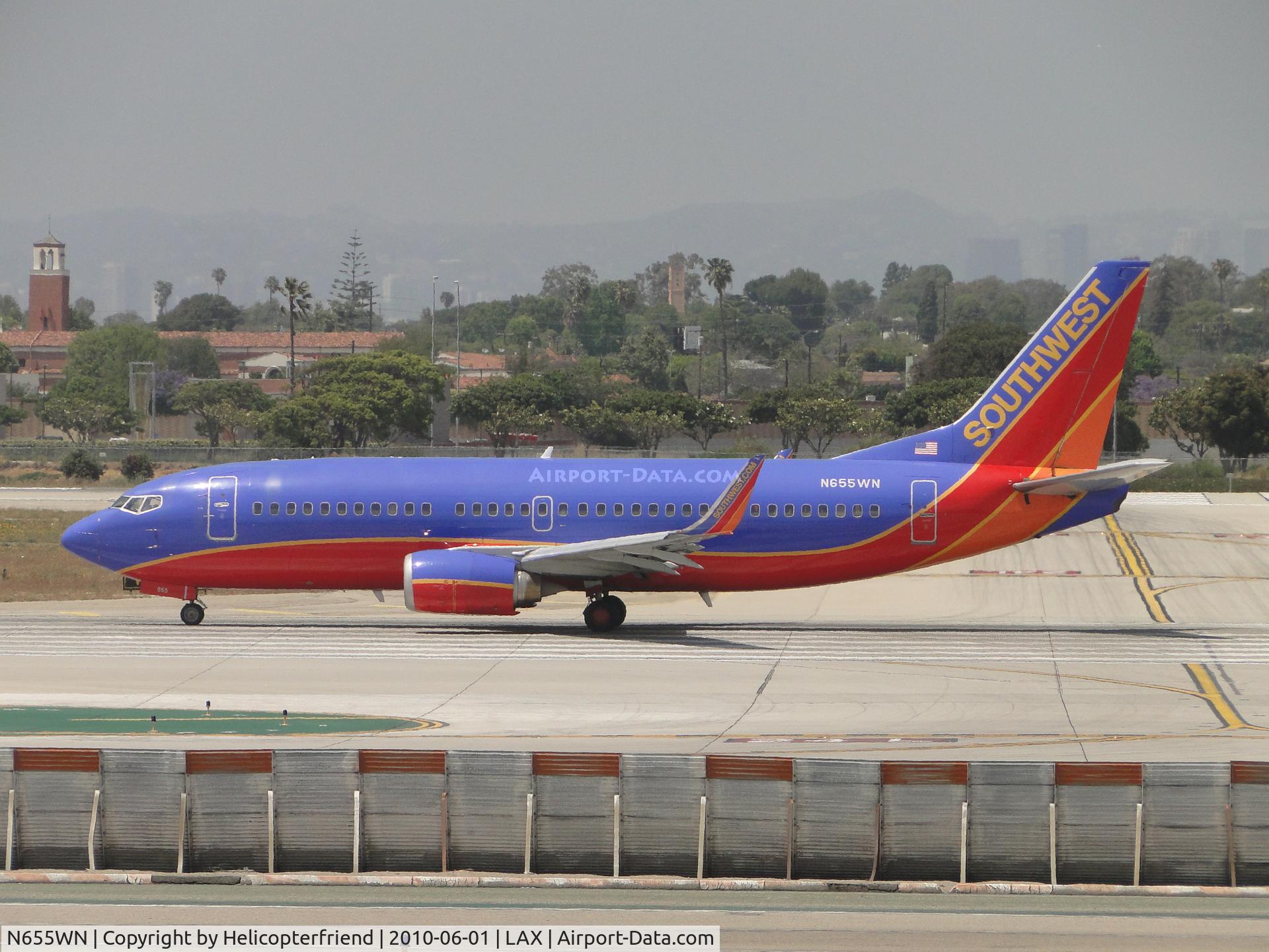 N655WN, 1997 Boeing 737-3H4 C/N 28400, Awaiting to start rolling for take off runway 24L