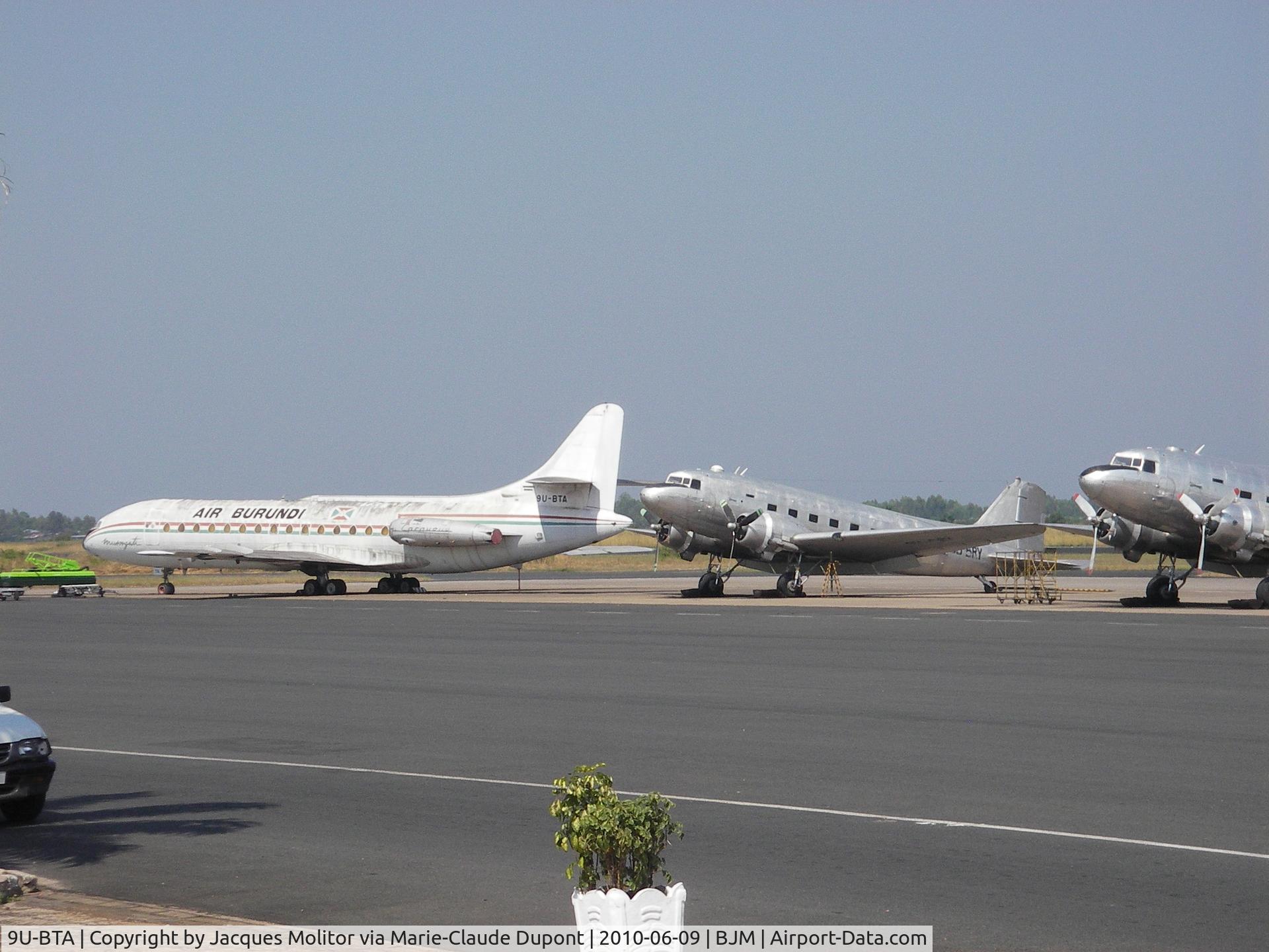 9U-BTA, 1963 Sud Aviation SE-210 Caravelle III C/N 144, June 2009, parked near 2 C-47 (9U-BRZ, 9U-BRY) in front of the old airport, left side of the V.I.P area ... looks good, in old painting of Air Burundi