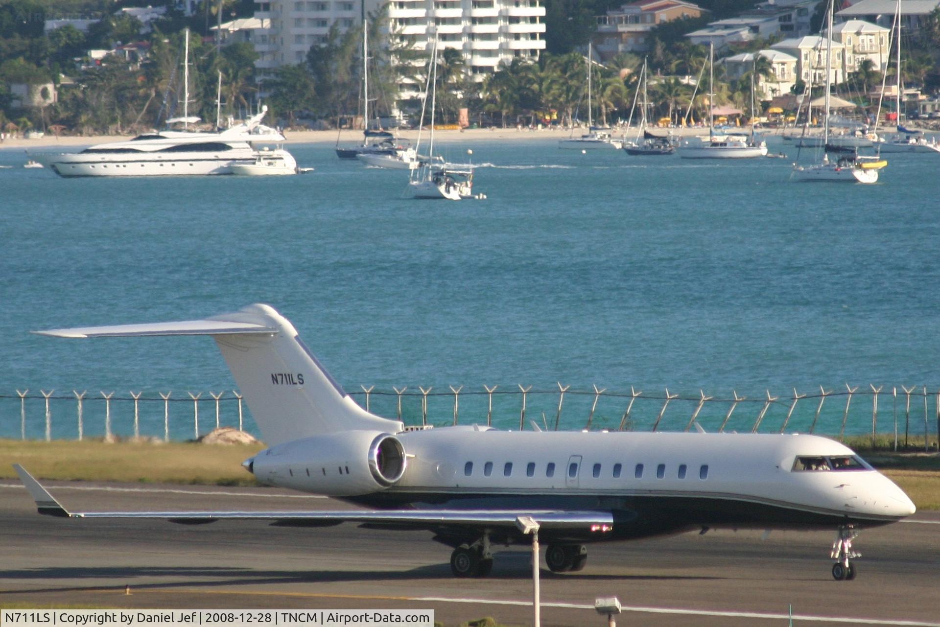 N711LS, 2004 Bombardier BD-700-1A11 Global 5000 C/N 9155, N711LS back tracking the active for take off from TNCM