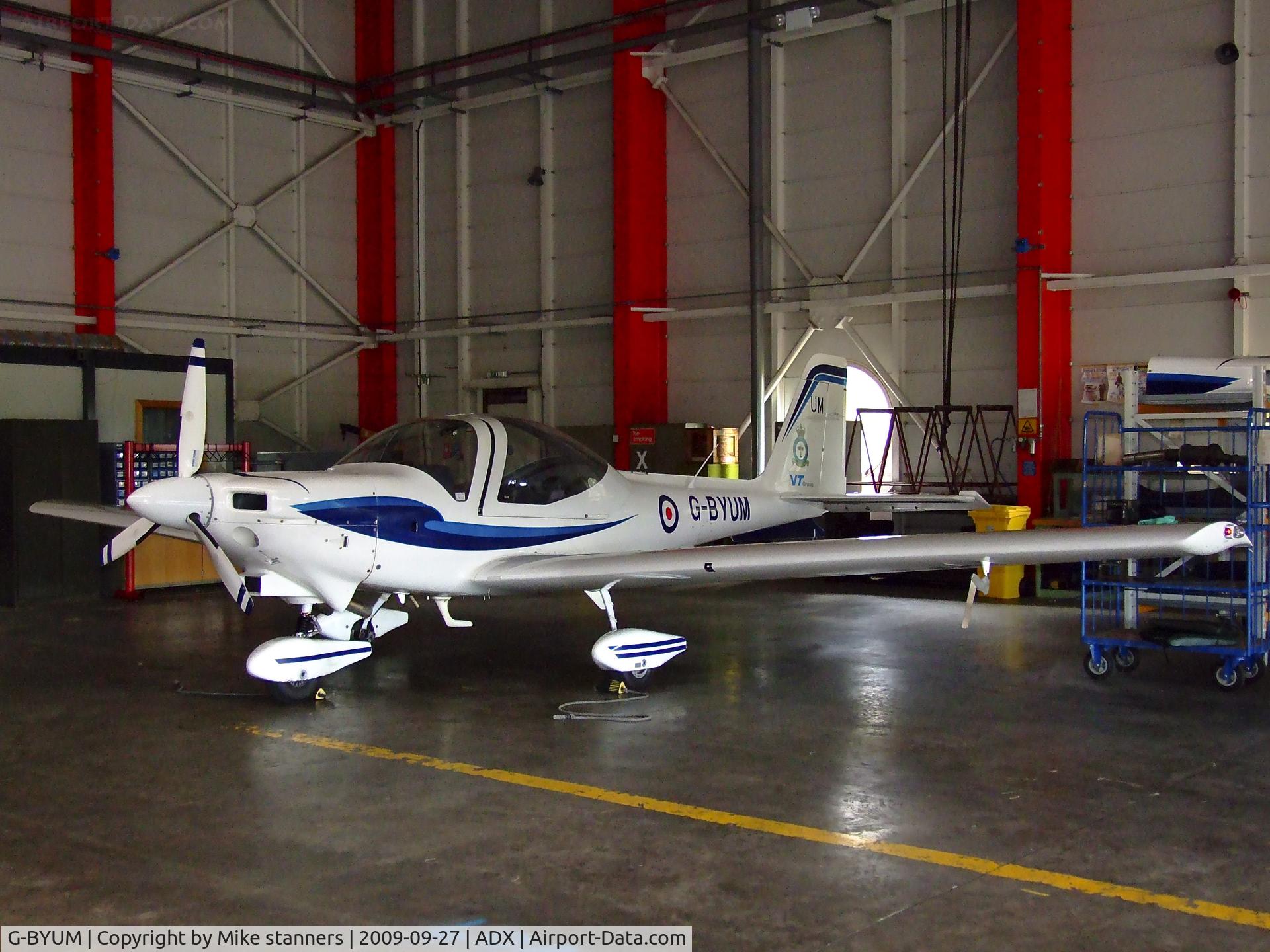G-BYUM, 1999 Grob G-115E Tutor T1 C/N 82098/E, 1EFTS Tutor in the hanger at its home base
