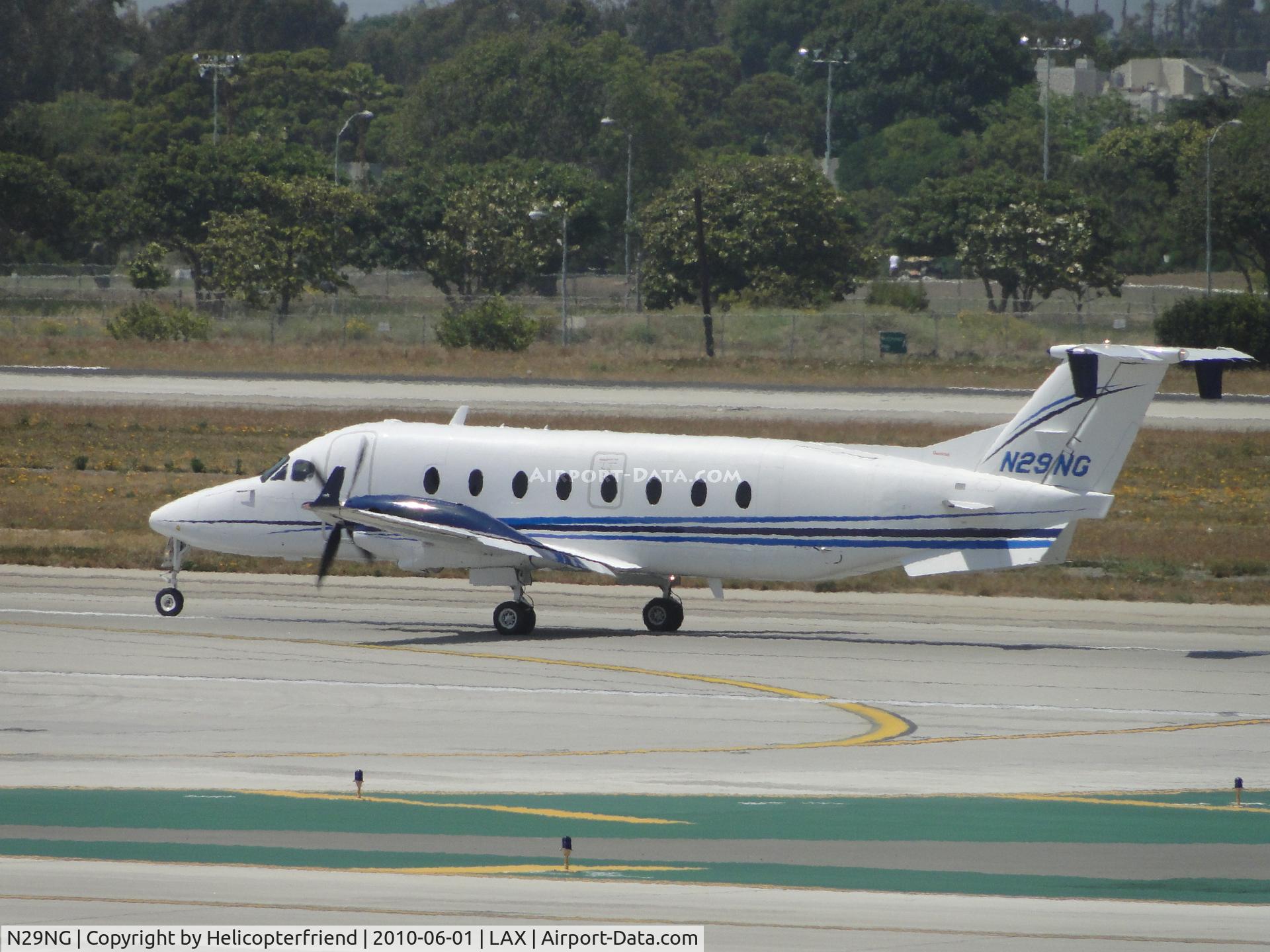 N29NG, 1997 Beech 1900D C/N UE-303, Starting take off role westbound on runway 24L