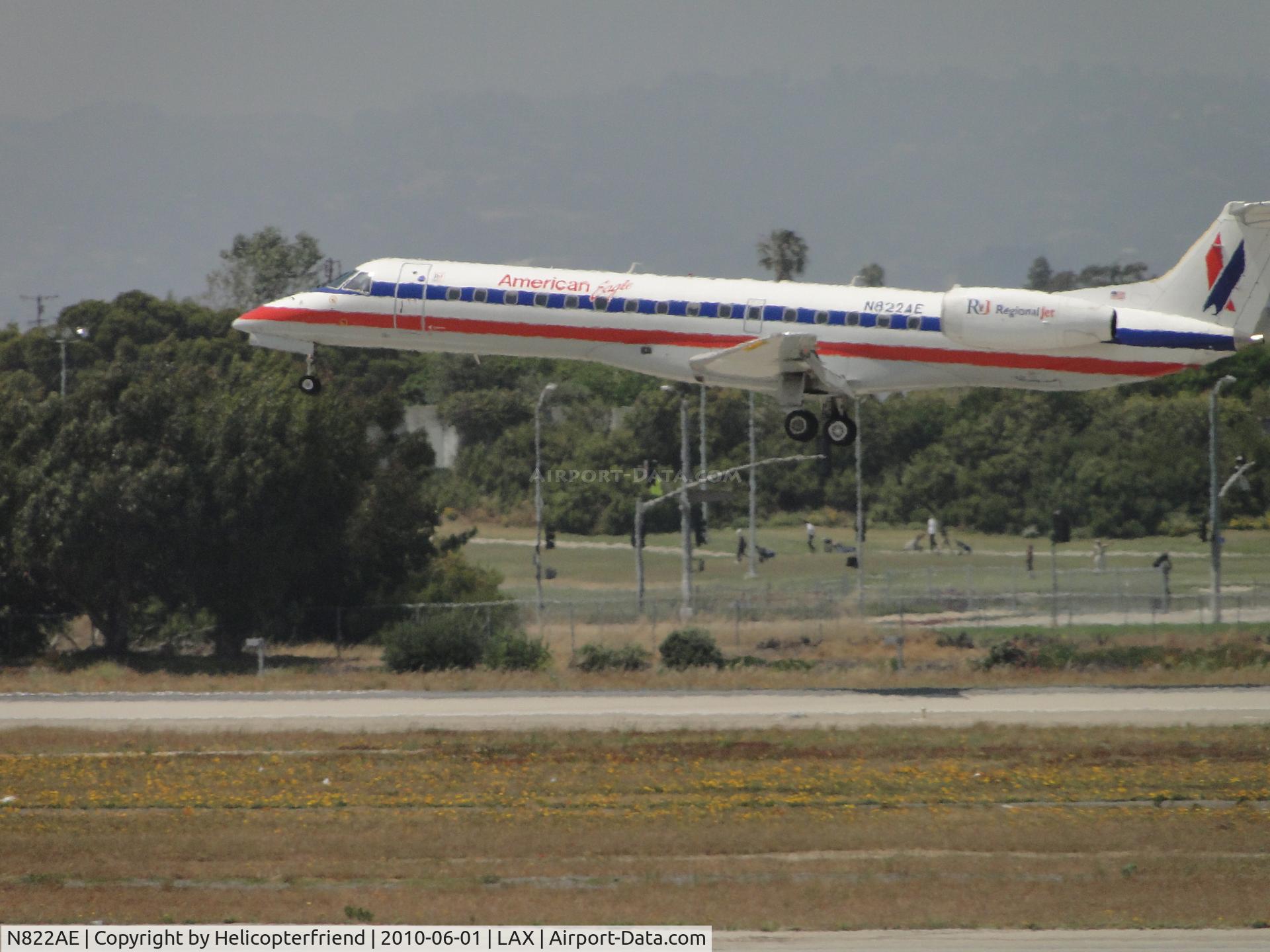 N822AE, 2002 Embraer ERJ-140LR (EMB-135KL) C/N 145581, Landing runway 24R