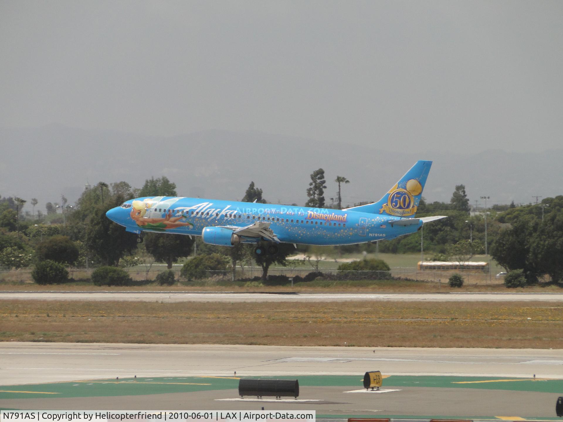 N791AS, 1997 Boeing 737-490 C/N 28886, Alaska Airlines Disney 50TH Anniversary with Tinker Bell leading, land on runway 24R