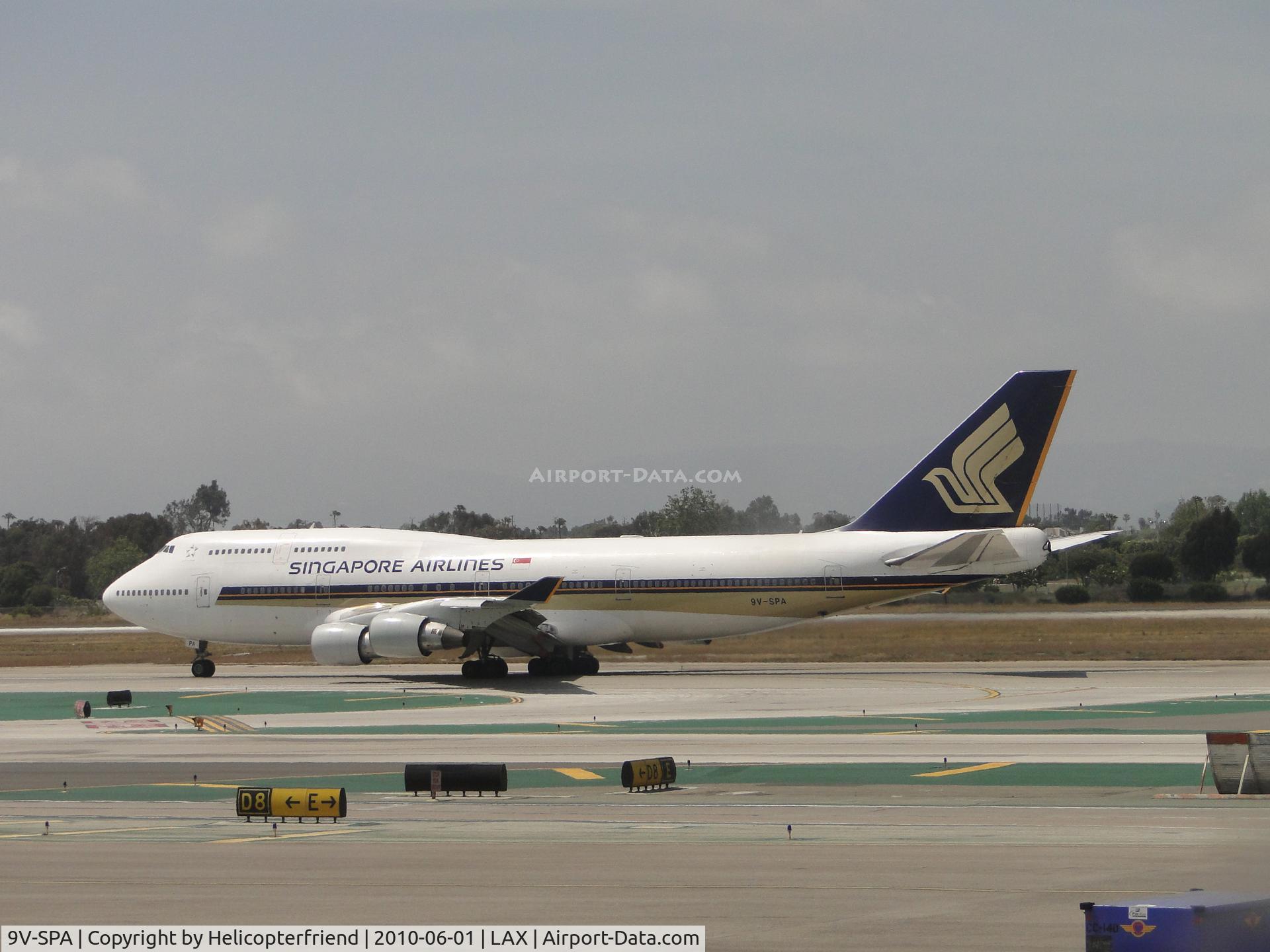 9V-SPA, Boeing 747-412 C/N 26550, Starting take off roll westbound from runway 24L
