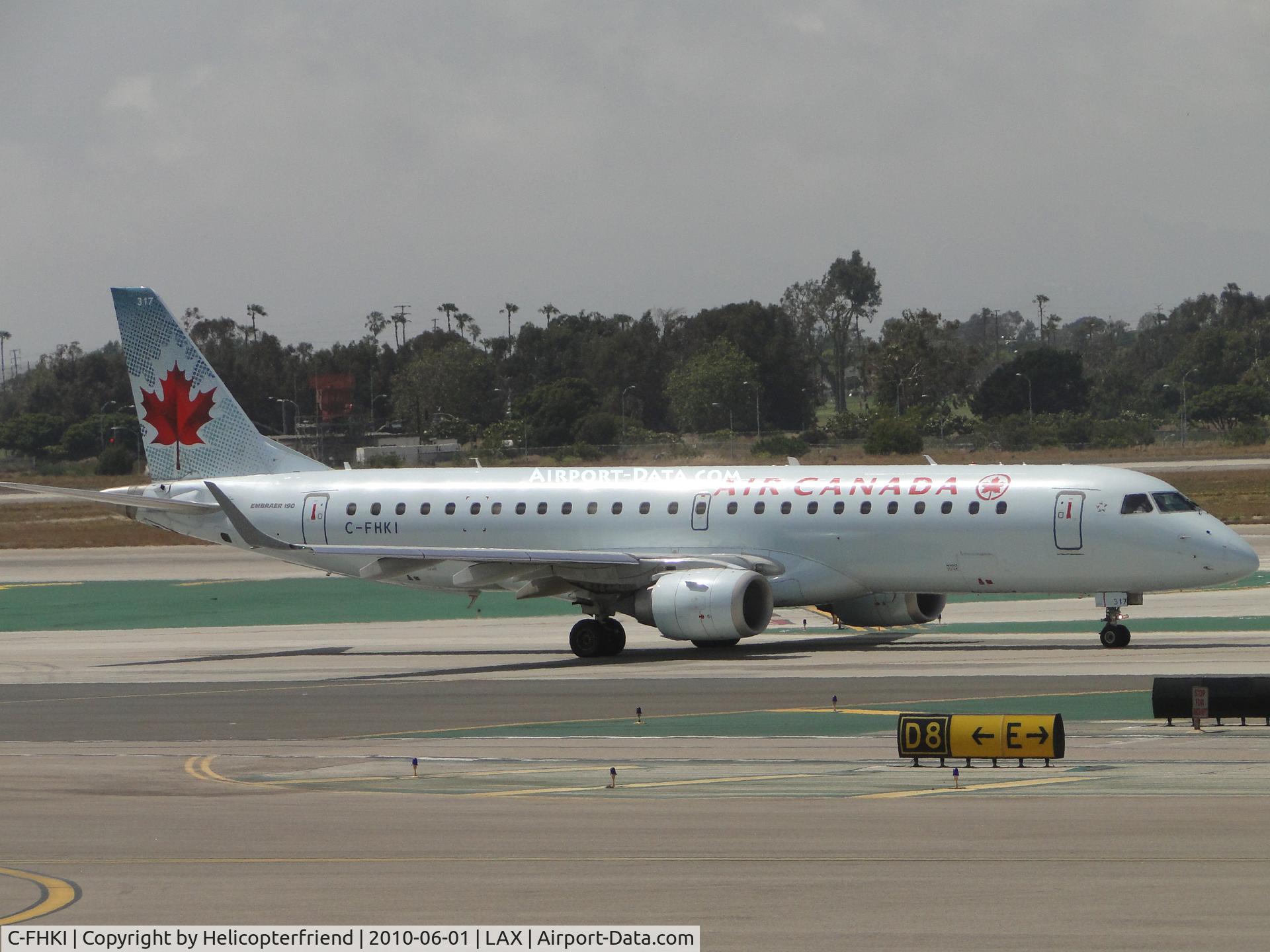 C-FHKI, 2006 Embraer 190AR (ERJ-190-100IGW) C/N 19000052, Taxiing towards runway 24L