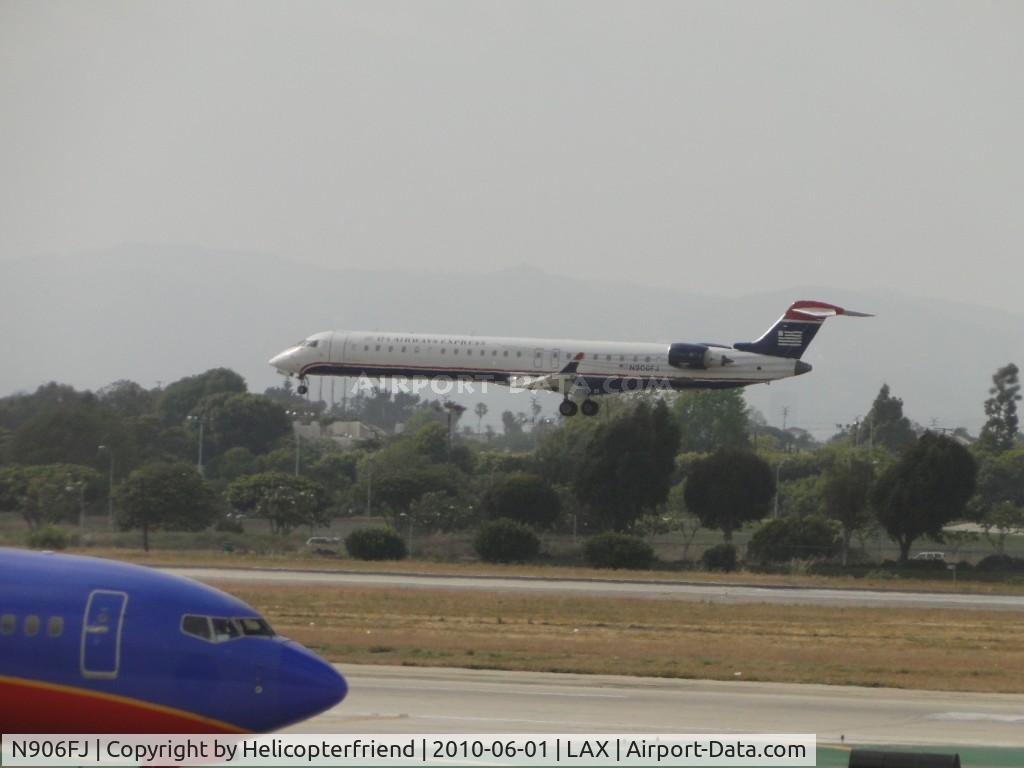 N906FJ, 2003 Bombardier CRJ-900ER (CL-600-2D24) C/N 15006, Landing 24R