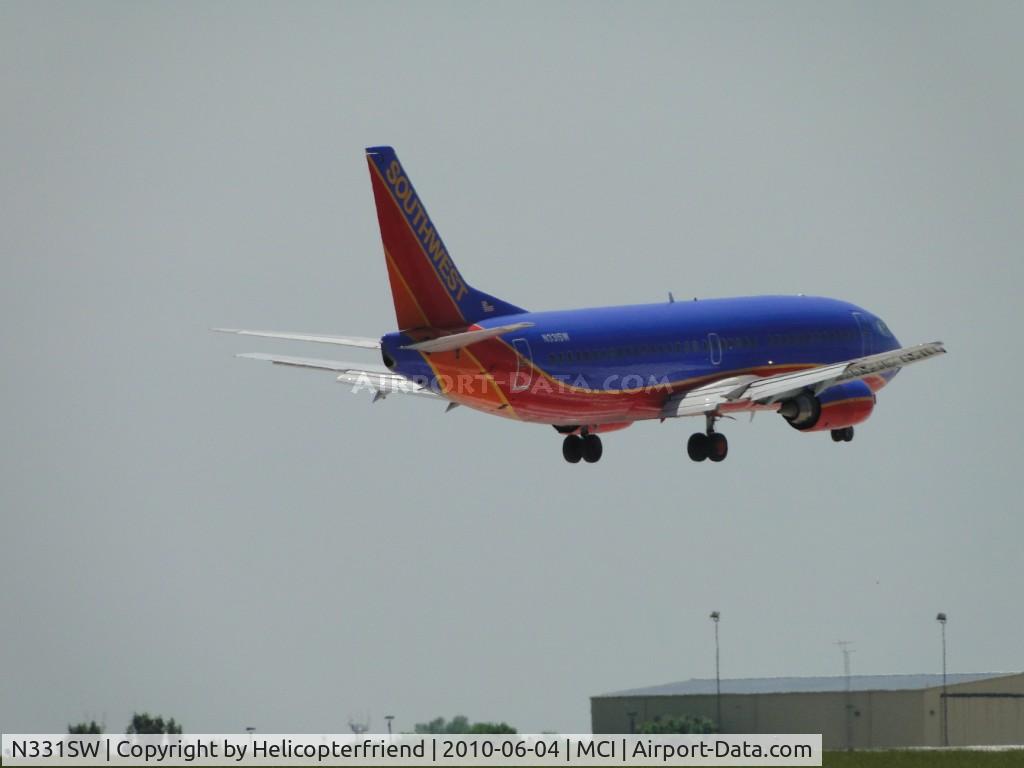 N331SW, 1988 Boeing 737-3H4 C/N 23695, Landing on 19R
