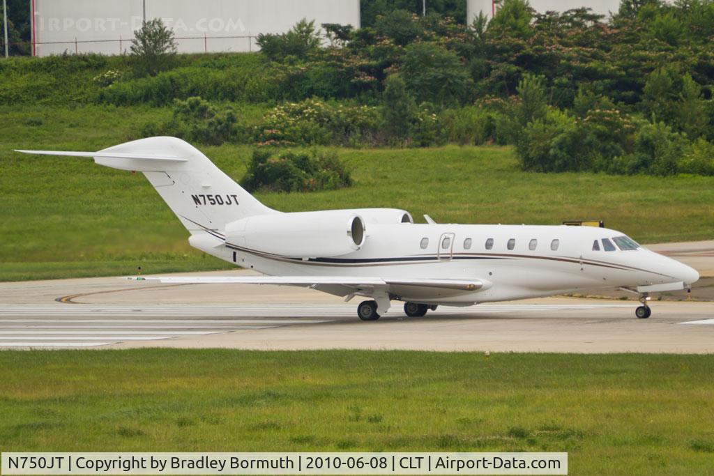 N750JT, Cessna 750 Citation X C/N 750-0302, Cessna Citation 750 taking off at CLT.  Photo taken from the viewing area at the approach end of runway 18C.