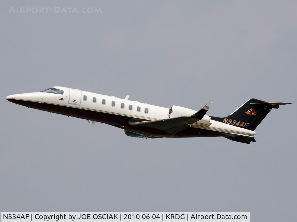 N334AF, 2001 Learjet Inc 45 C/N 143, Leaving KRDG