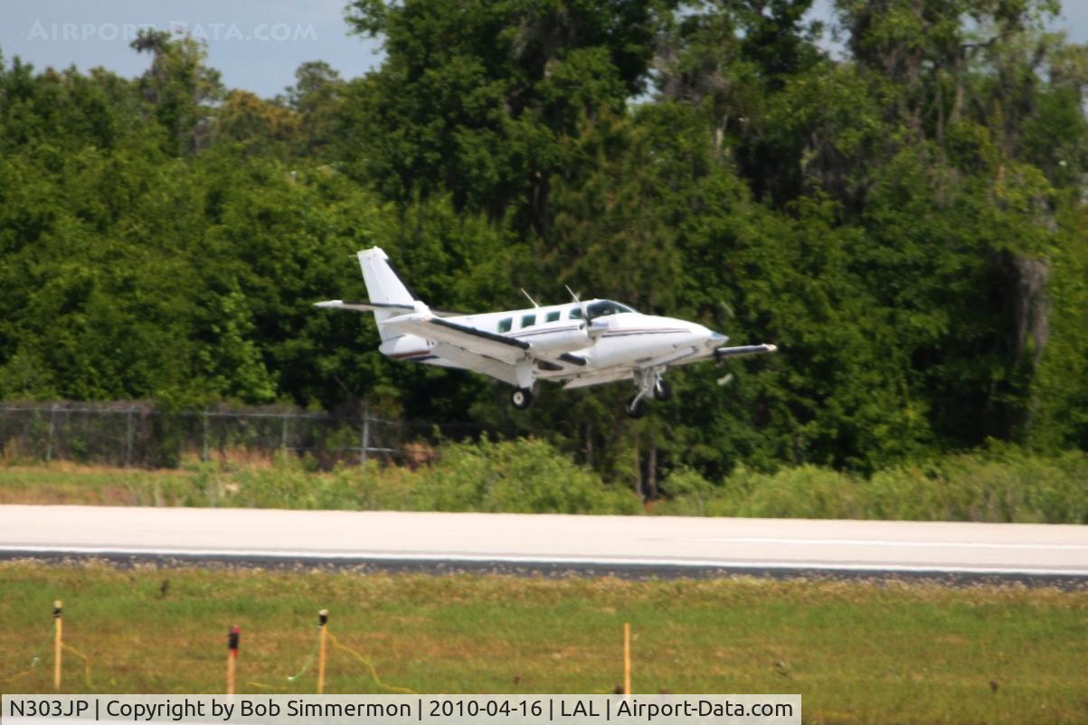 N303JP, 1982 Cessna T303 Crusader C/N T30300067, Arriving at Lakeland, Florida during Sun N Fun 2010.