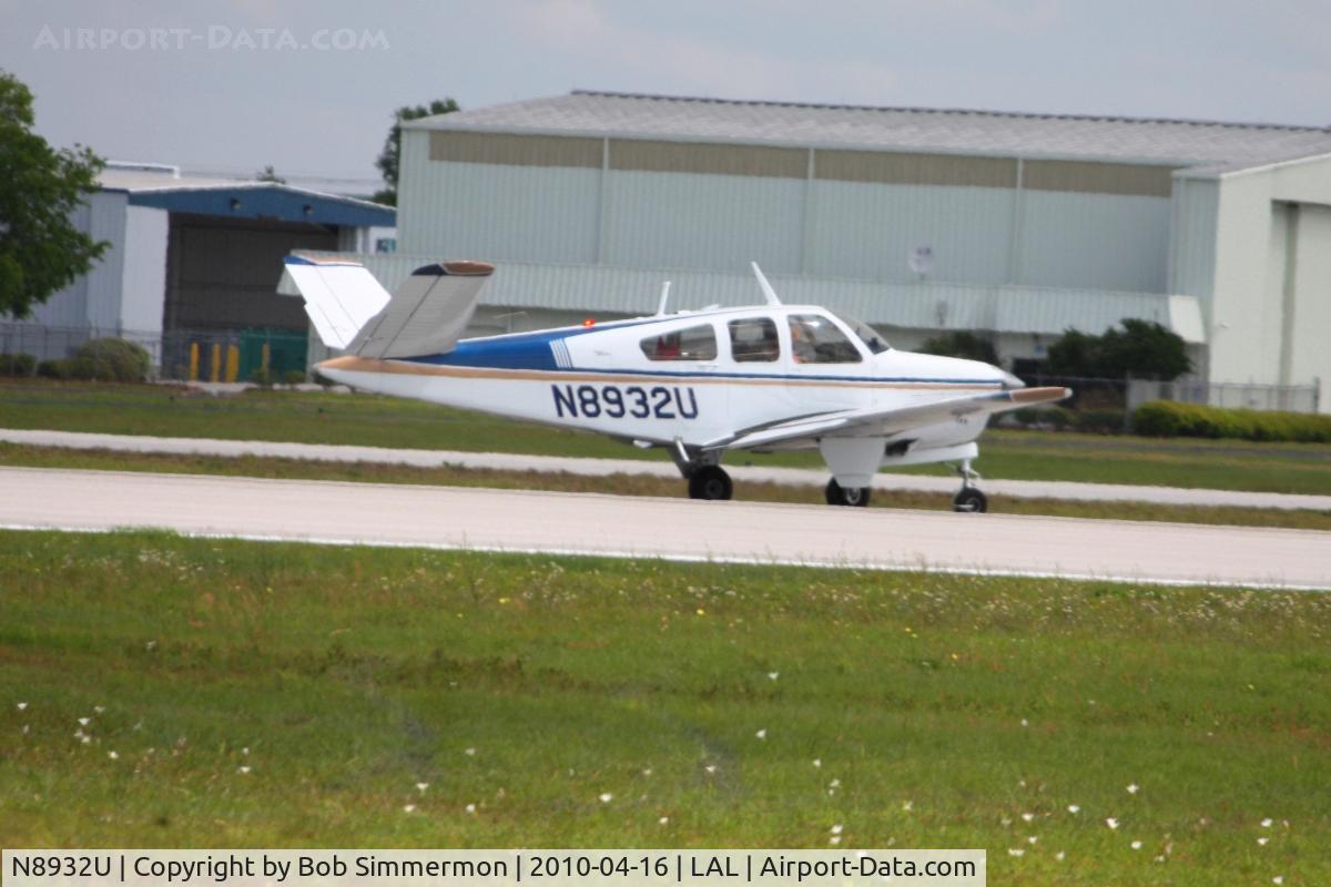N8932U, 1965 Beech S35 Bonanza C/N D-7921, Departing Lakeland, Florida during Sun N Fun 2010.