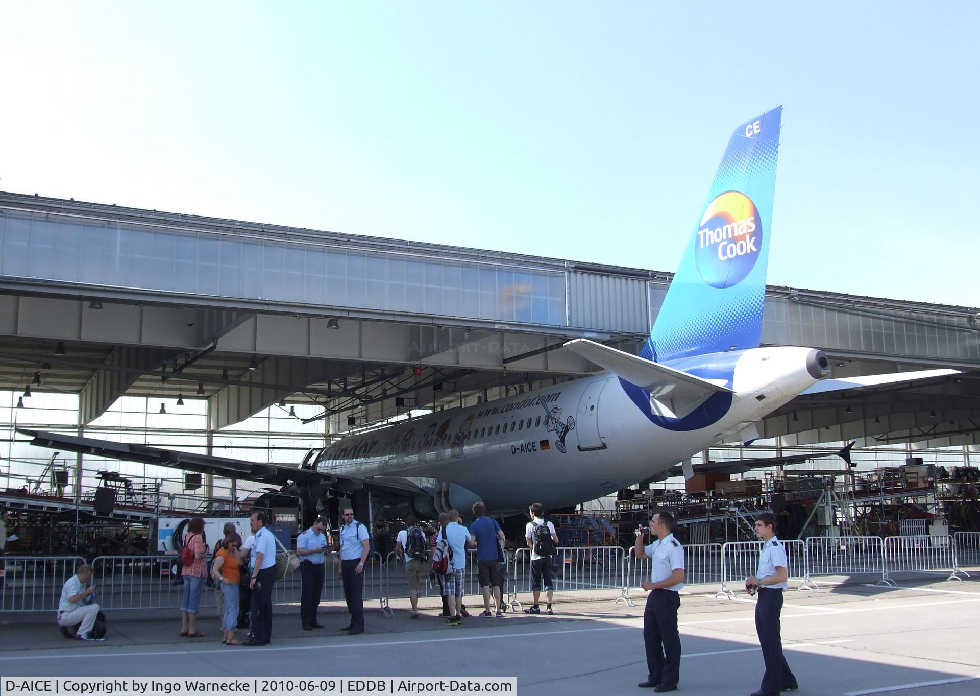 D-AICE, 1998 Airbus A320-212 C/N 0894, Airbus A320-212 of Condor with 'Peanuts' special design in the maintenance Hangar of Berlin-Schönefeld airport during the ILA 2010