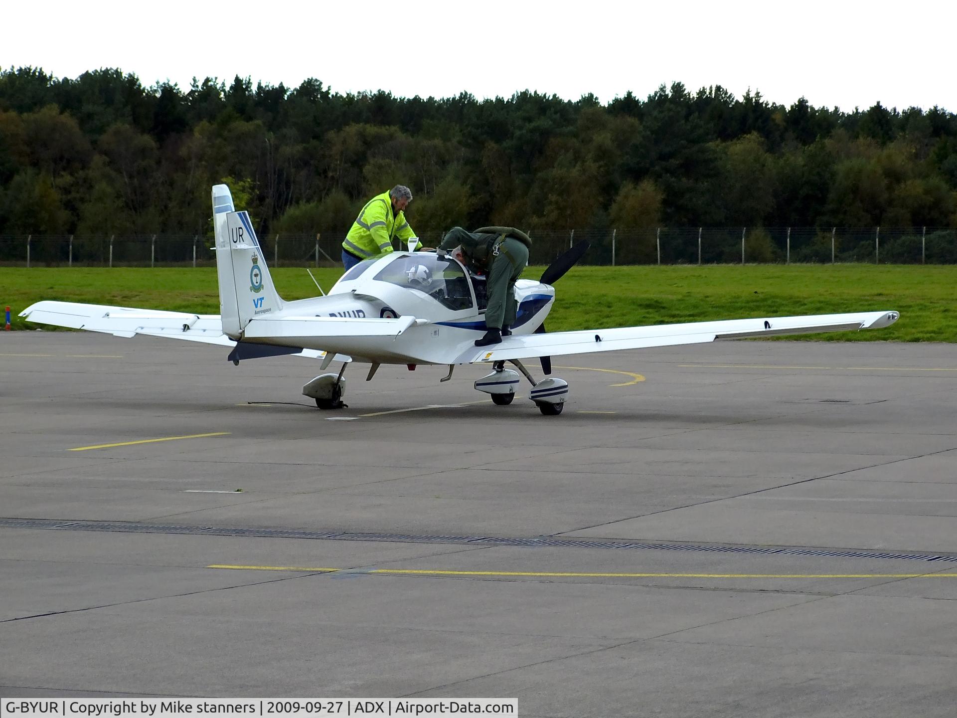 G-BYUR, 1999 Grob G-115E Tutor T1 C/N 82102/E, 1EFTS/12AEF Tutor getting readied for a sortie at its home base