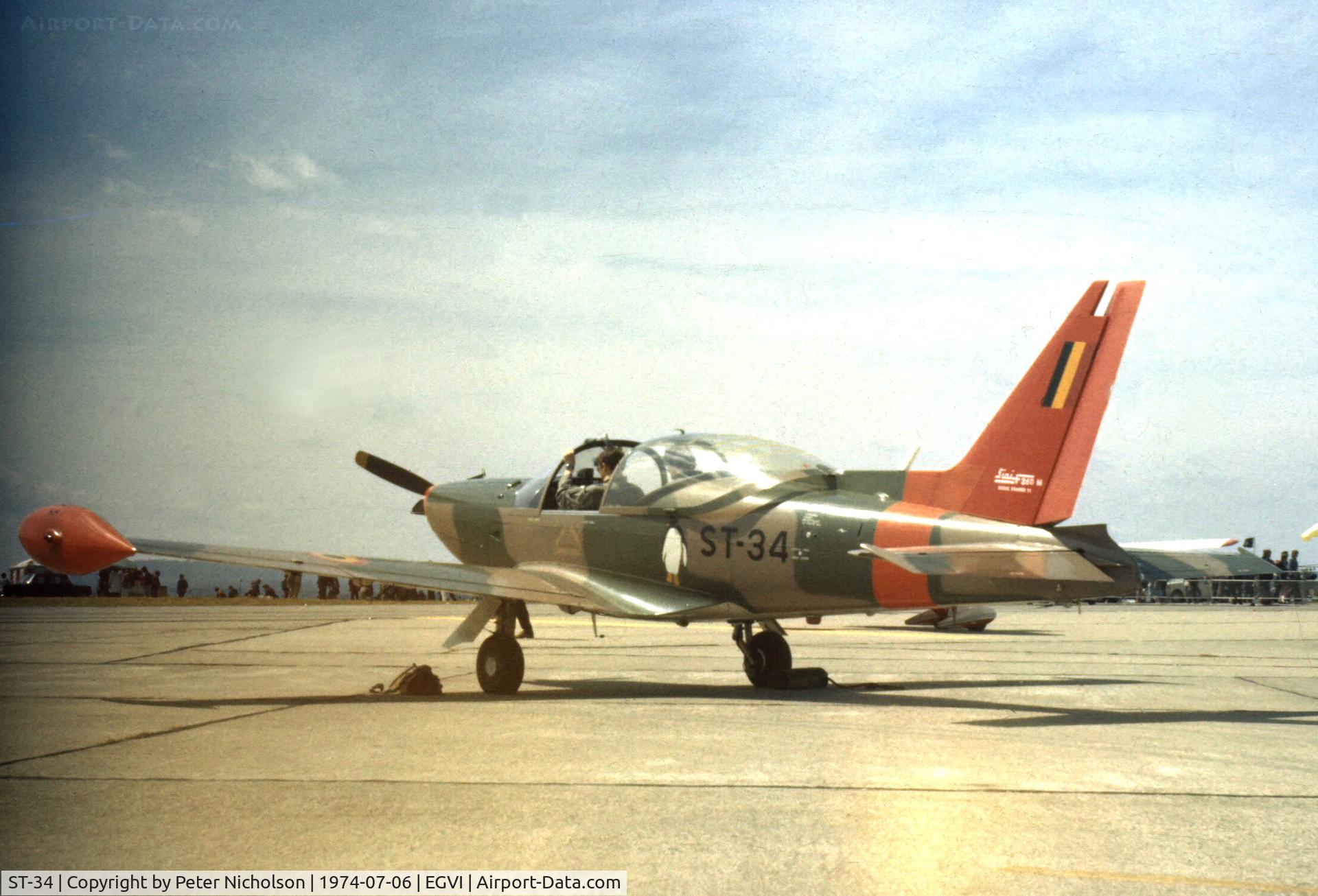 ST-34, SIAI-Marchetti SF-260MB C/N 10-34, SIAI SF.260MB of the Belgian Air Force on display at the 1974 Intnl Air Tattoo at RAF Greenham Common.