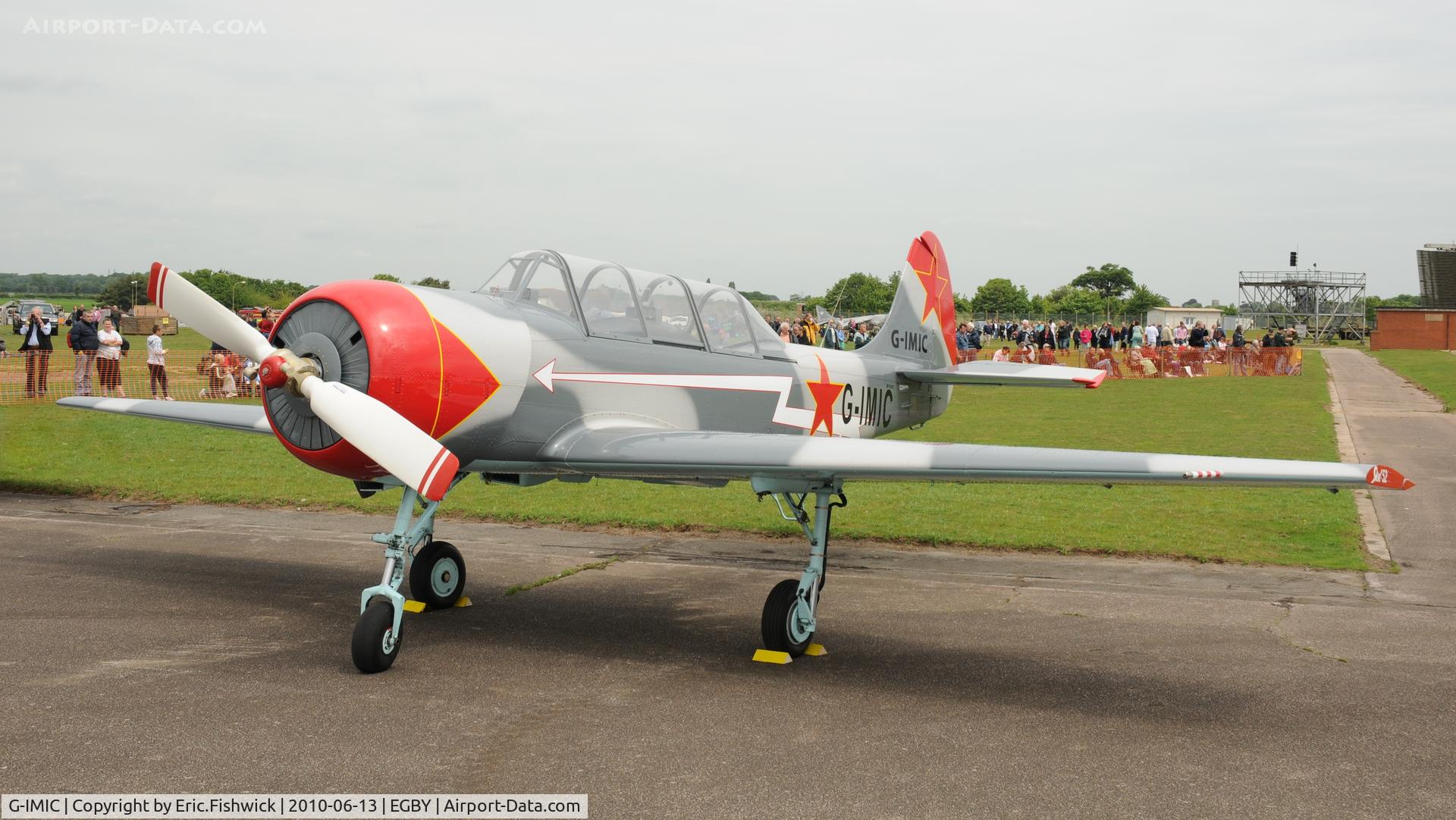 G-IMIC, 1989 Bacau Yak-52 C/N 8910001, G-IMIC at Bentwaters Park Airshow June 2010